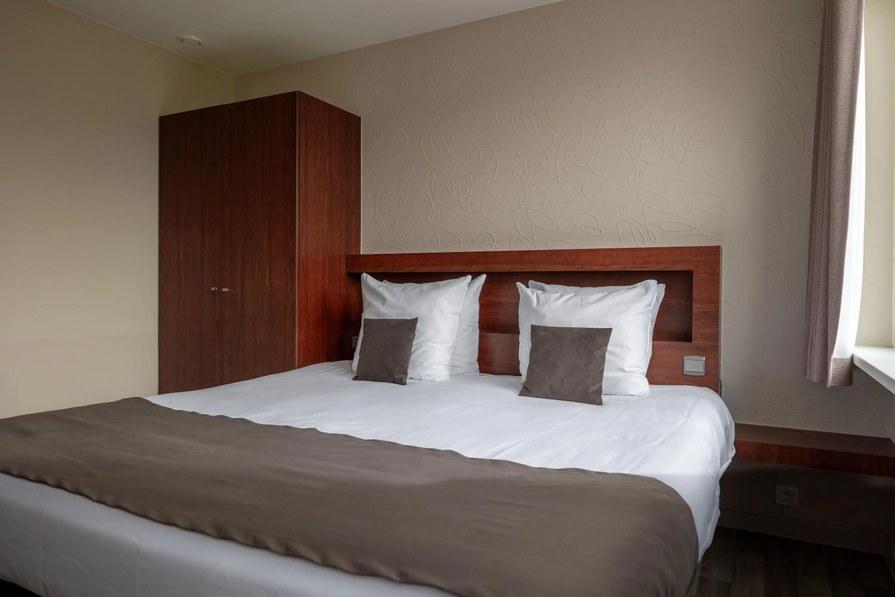 Bed in Hotel Olympia in Bruges