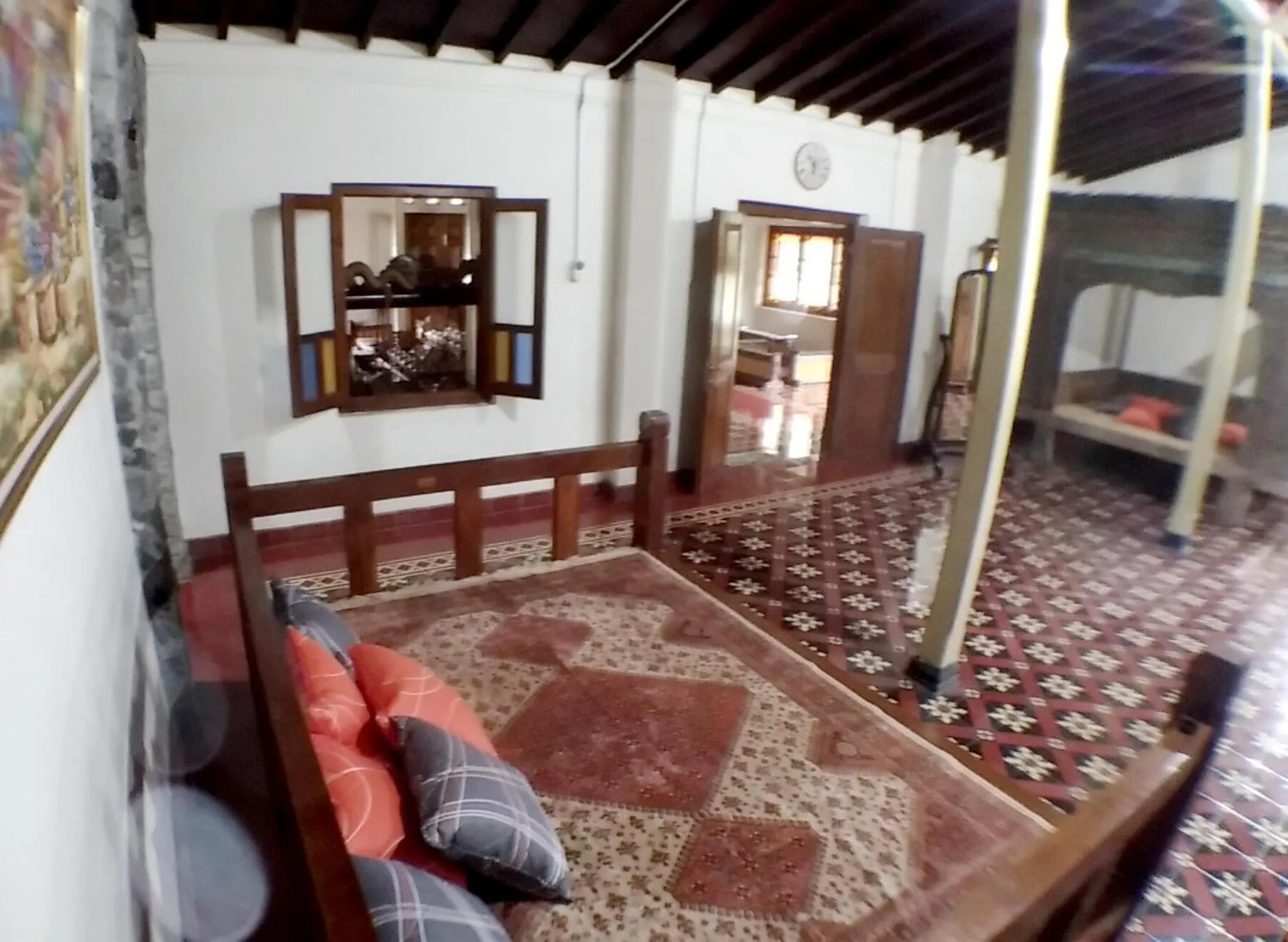 Communal lounge/ TV room, Bed in Omah Pitoe Yogya Homestay