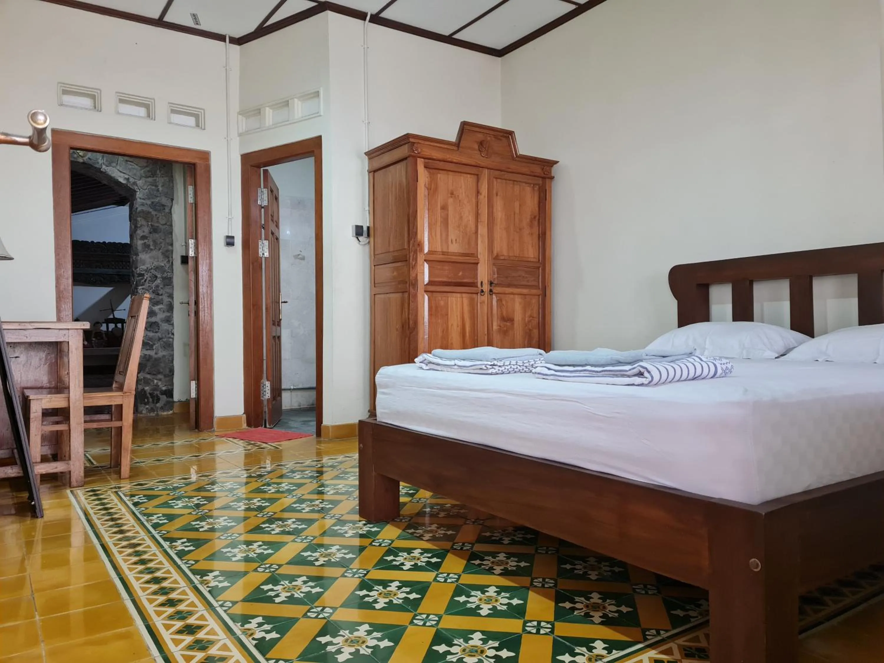 Bed in Omah Pitoe Yogya Homestay
