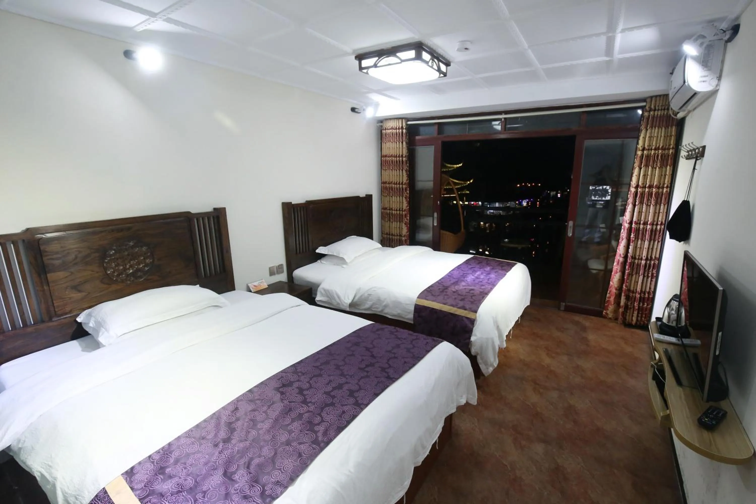 Photo of the whole room, Bed in LQJ Riverside Guest House