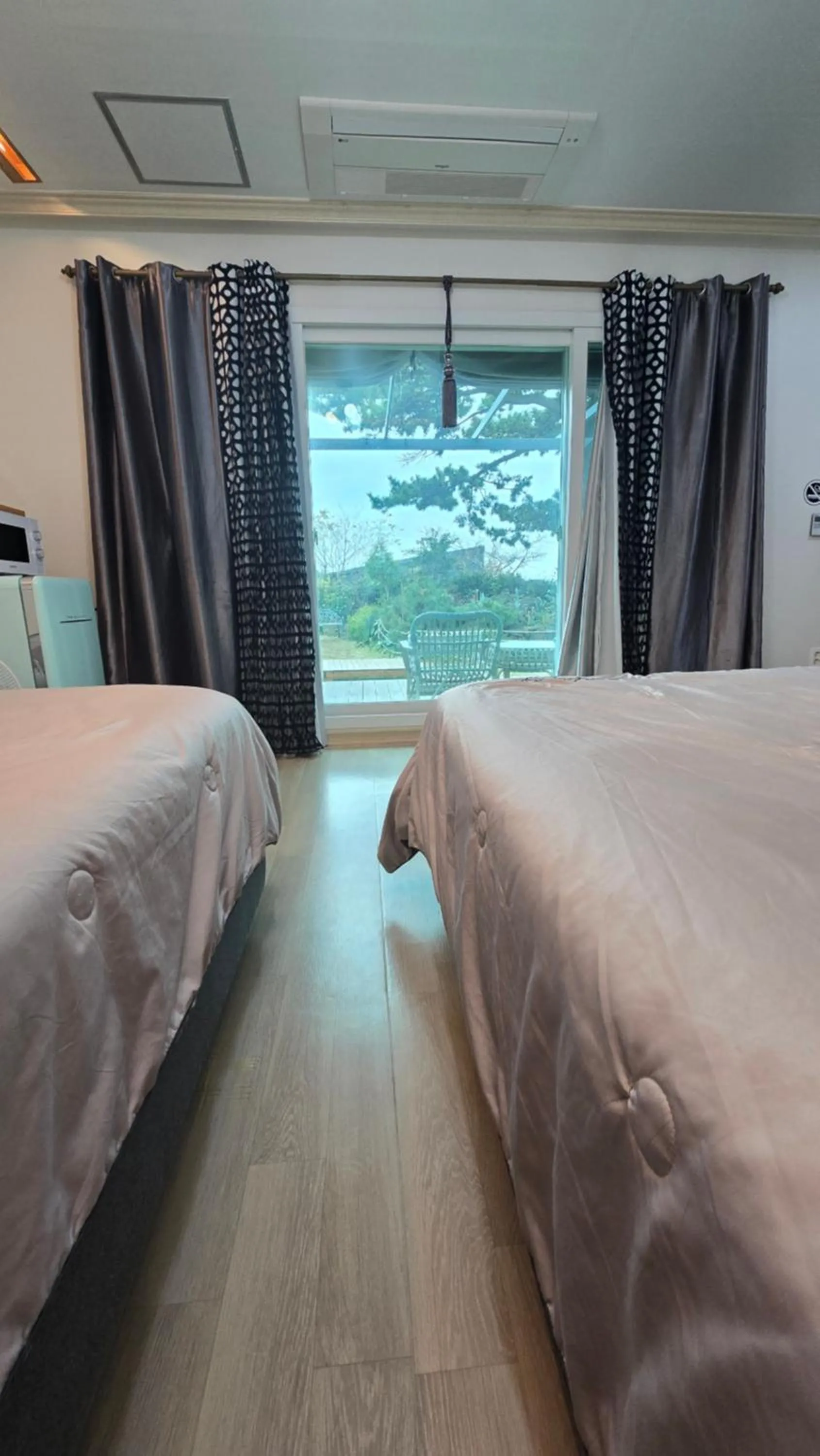 Bedroom, Bed in Wind Jeju Cafe & Pension