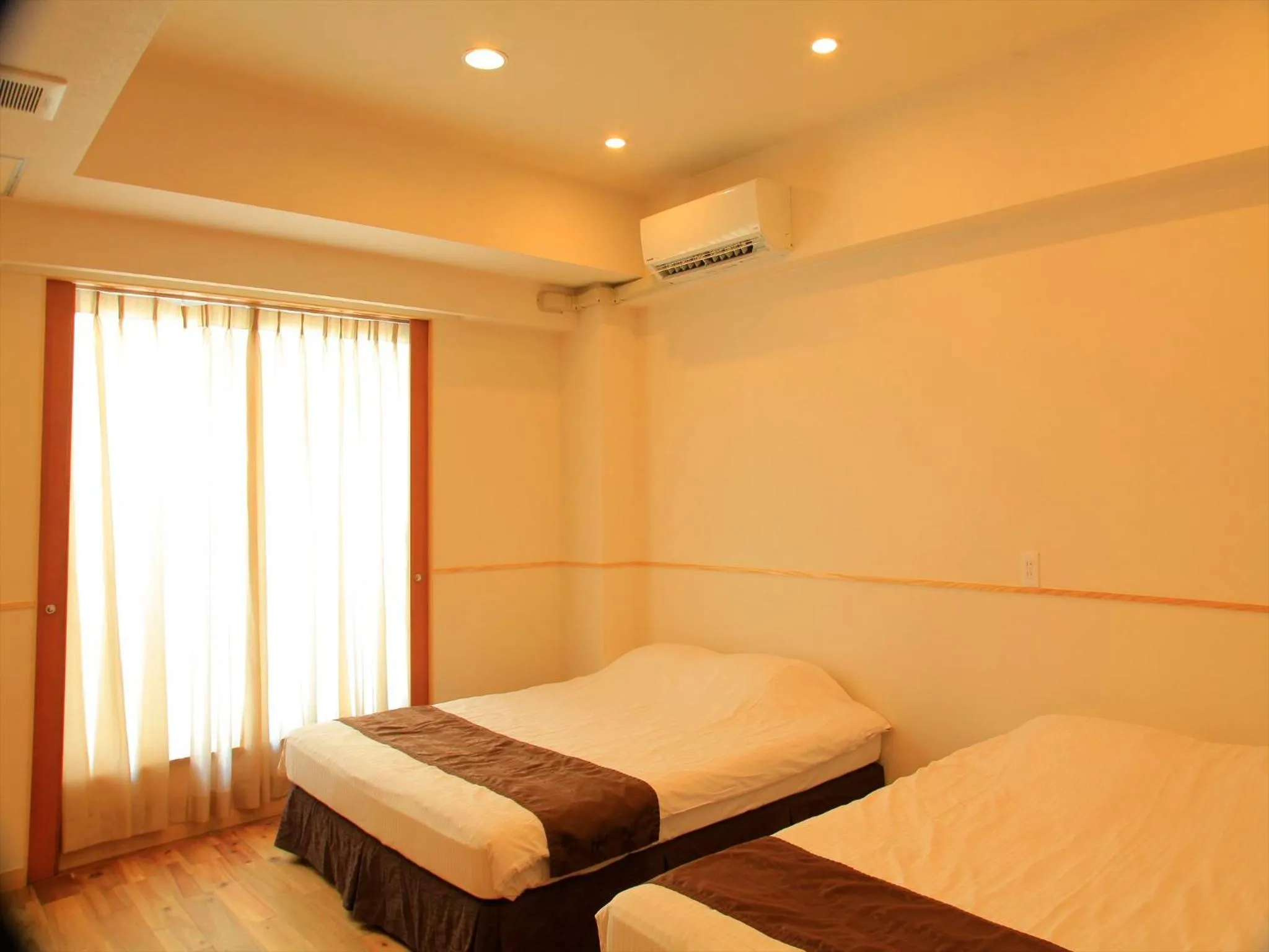 Living room, Bed in Hotel Sunset Terrace