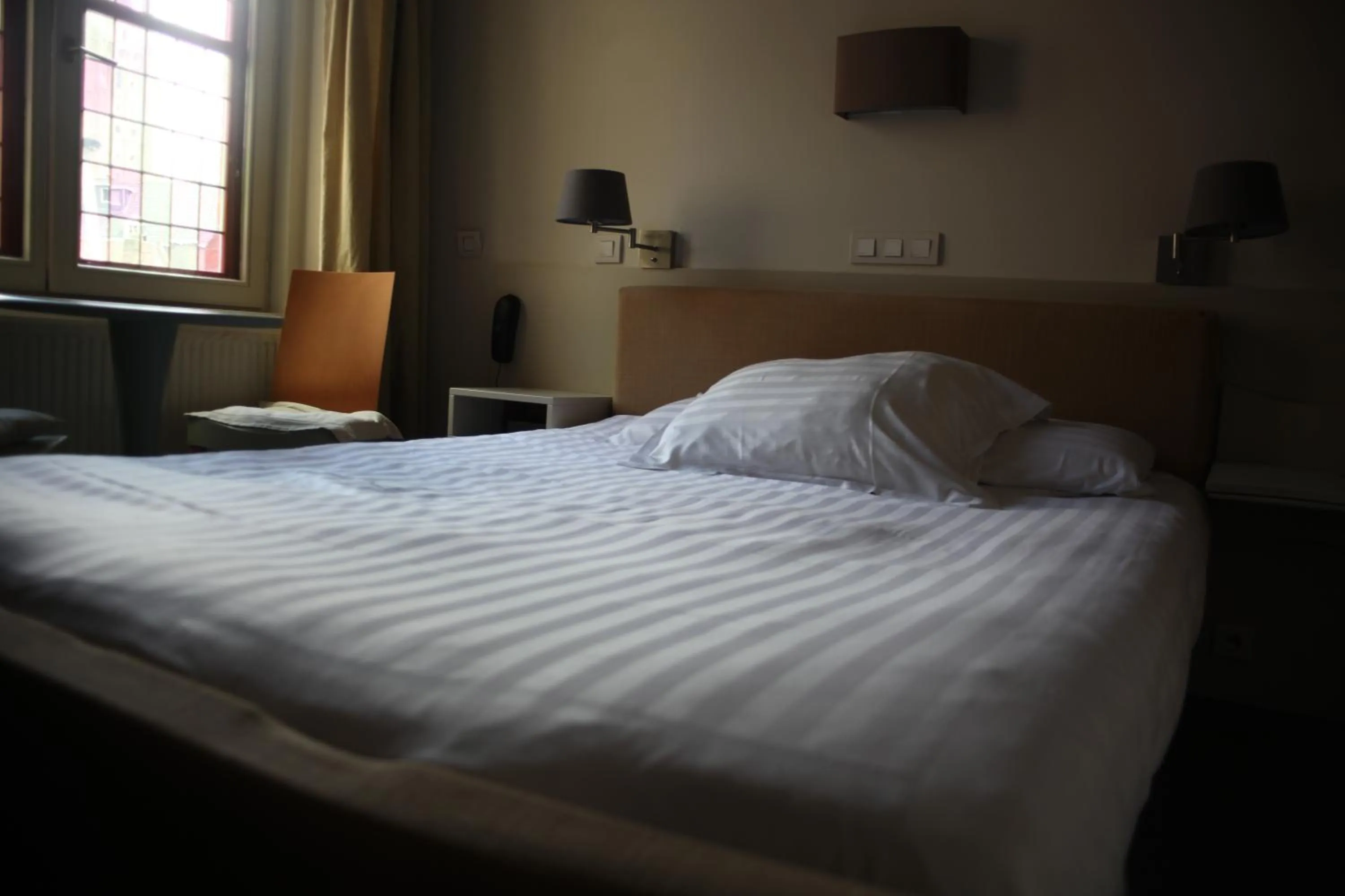 Bed in Hotel Salvators