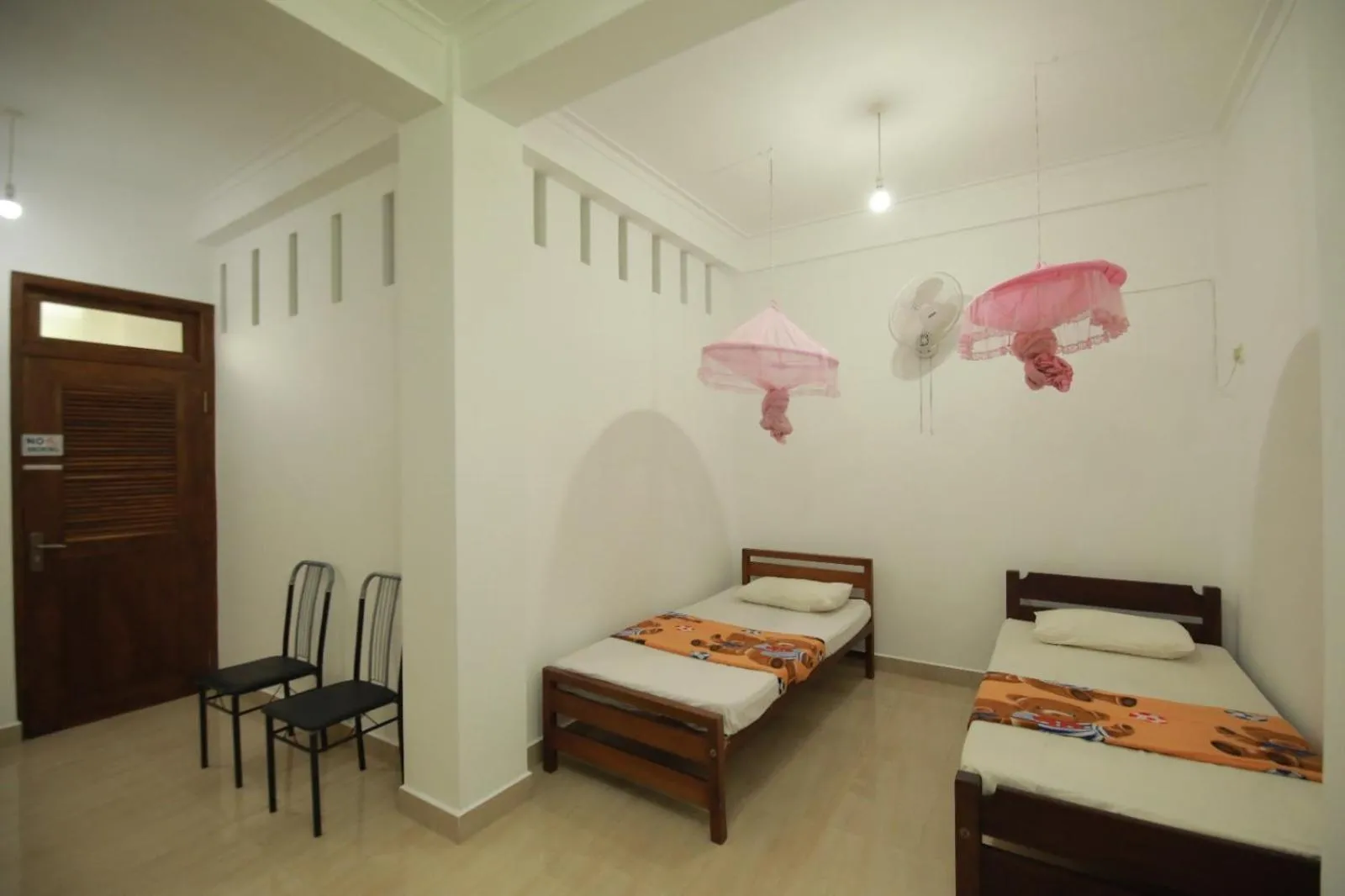 Bed in Renuka Inn