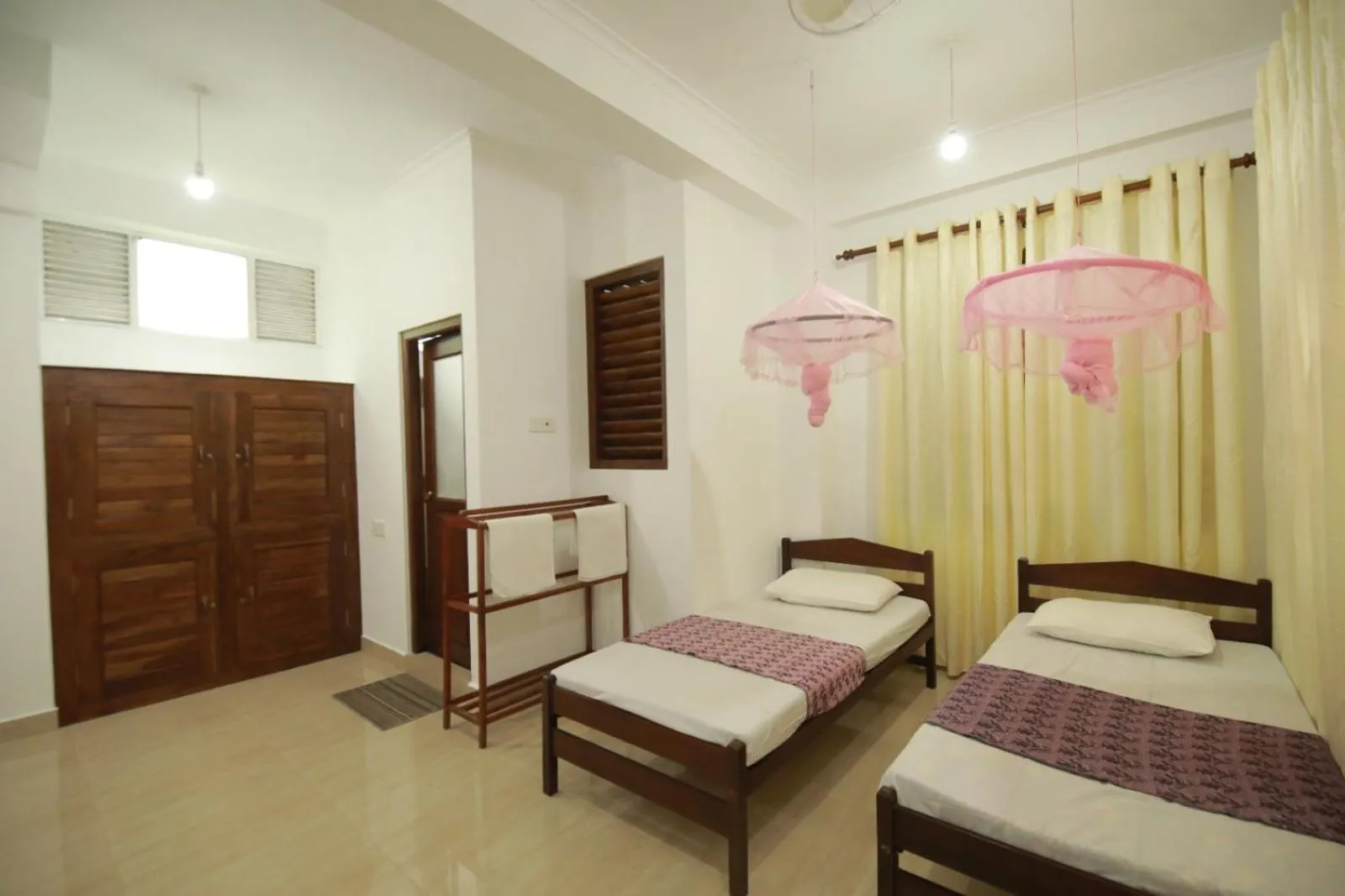 Bed in Renuka Inn