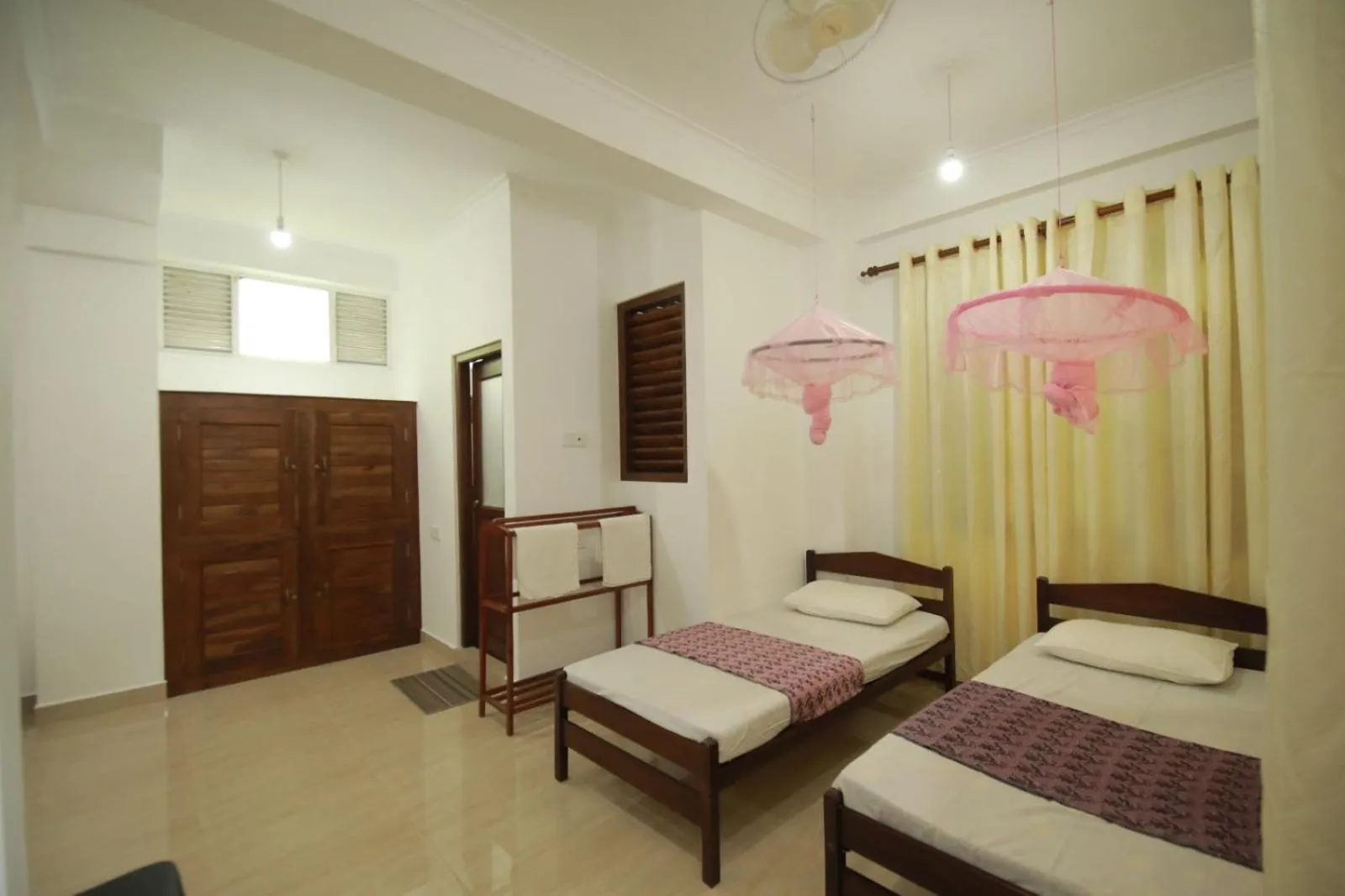 Bed in Renuka Inn