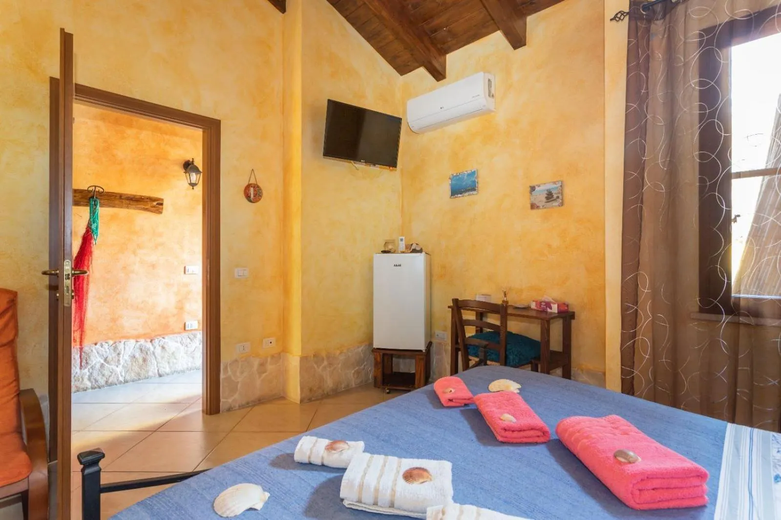 Bed in Affittacamere Shardana