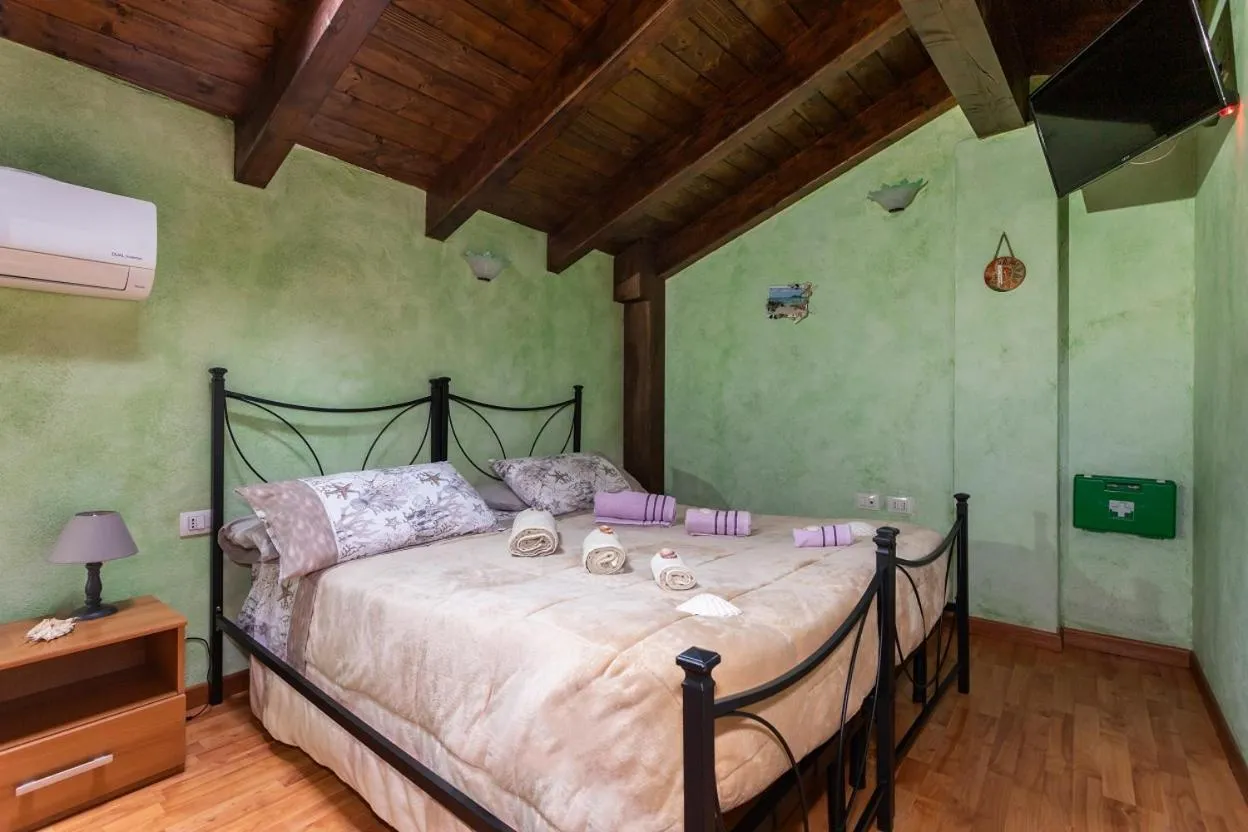 Photo of the whole room, Bed in Affittacamere Shardana
