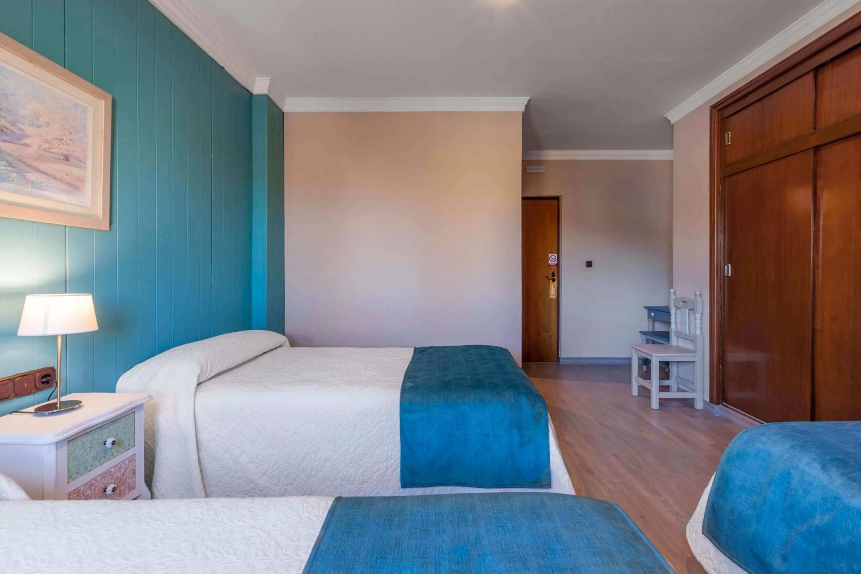 Bed in Hotel Sulayr