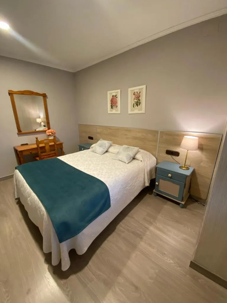 Bed in Hotel Sulayr