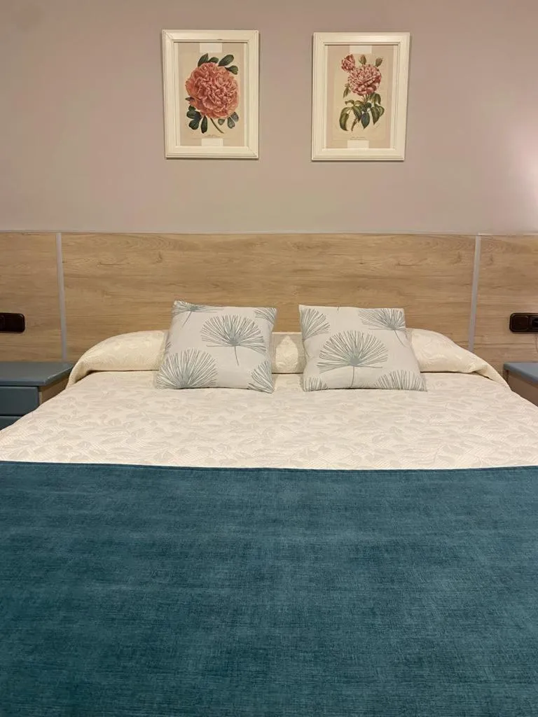 Bed in Hotel Sulayr