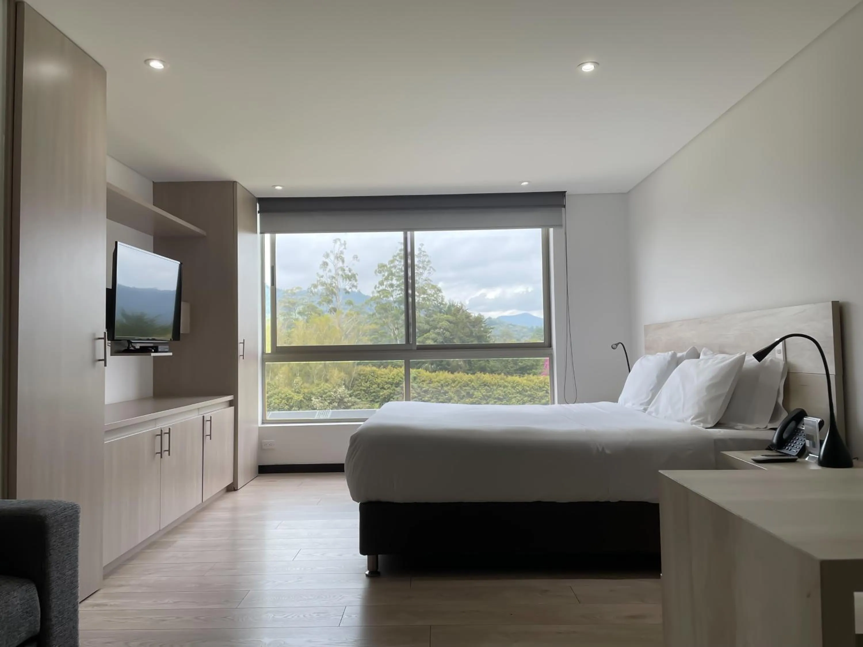 Bed in MG Hotels & Suites