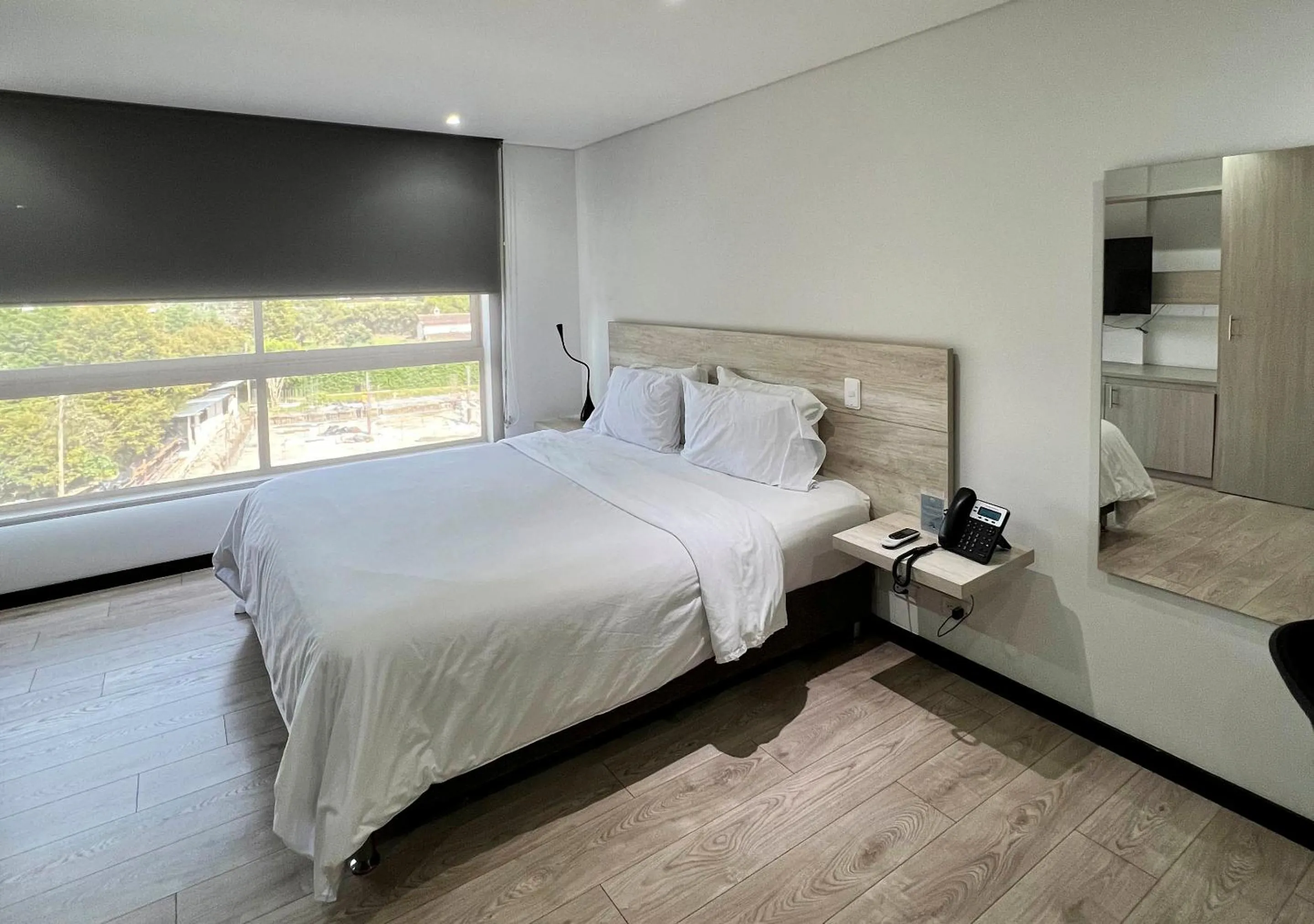 Bed in MG Hotels & Suites