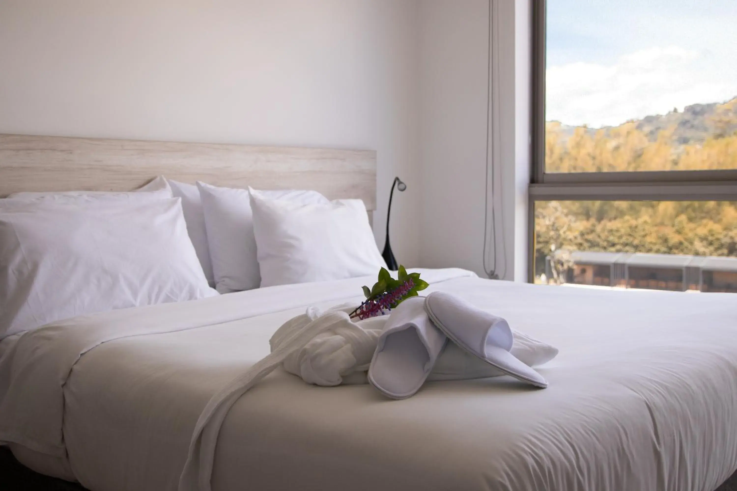 Bed in MG Hotels & Suites Bed in MG Hotels & Suites