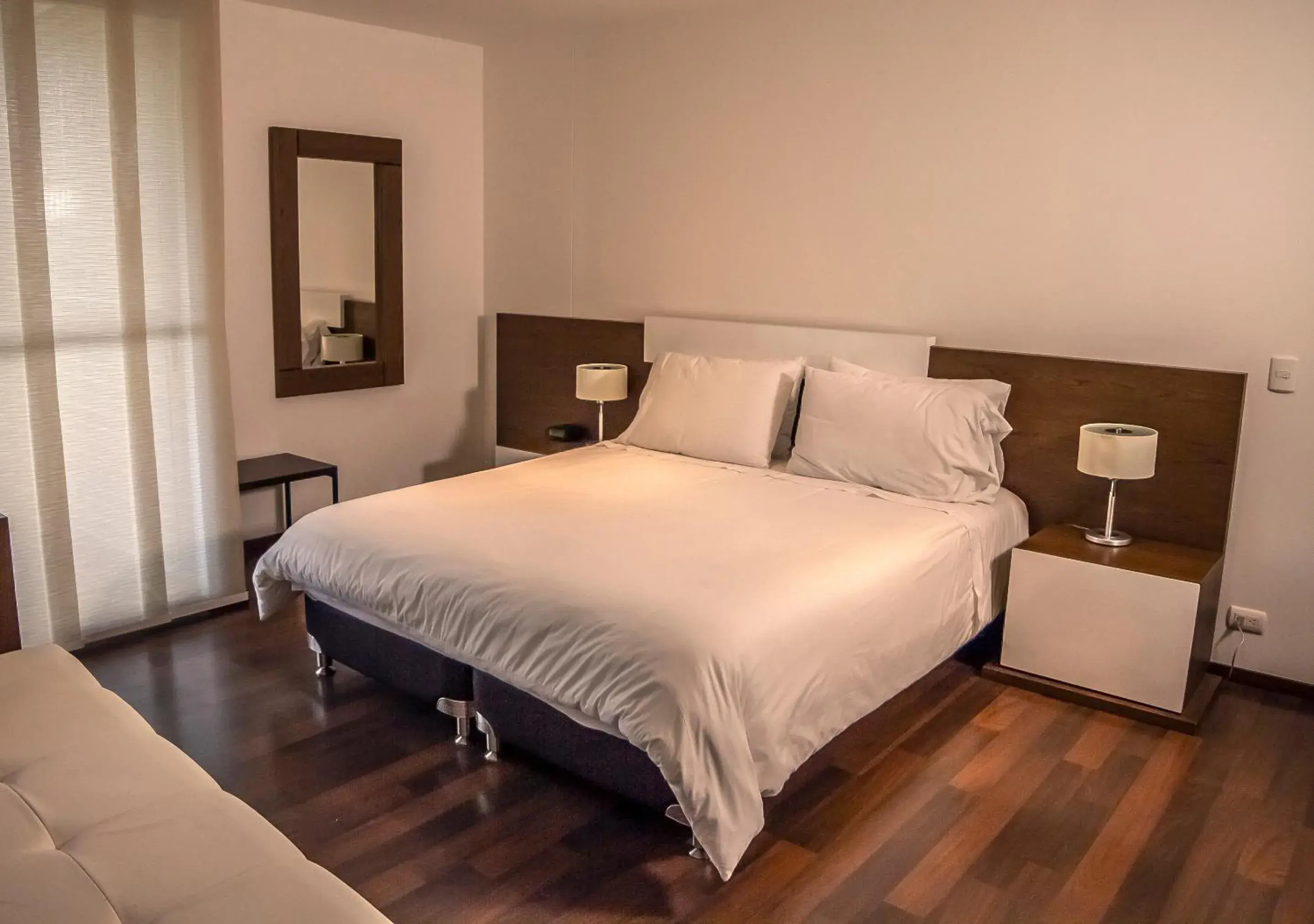 Bed in MG Hotels & Suites Bed in MG Hotels & Suites