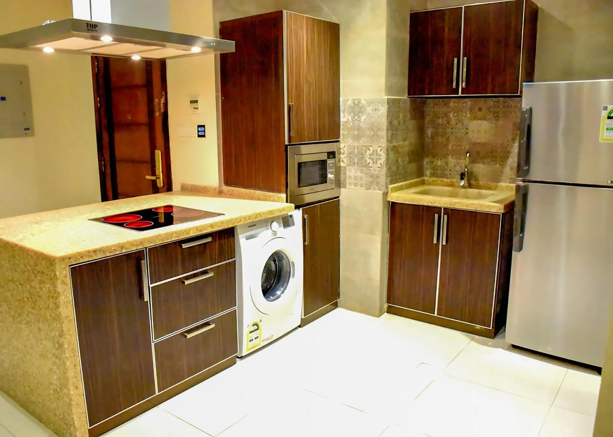 Kitchen or kitchenette in Procare Apart hotel