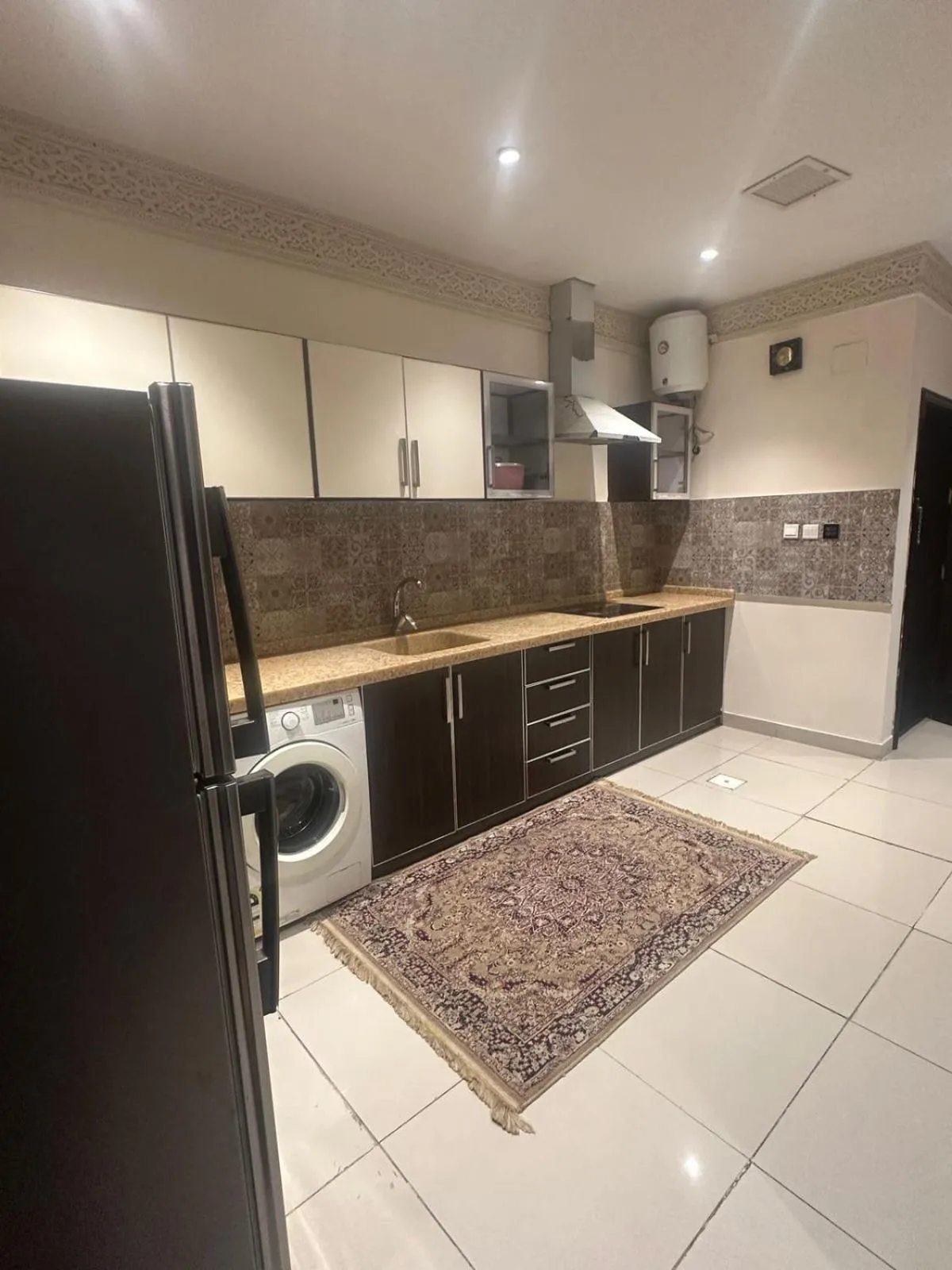 Kitchen or kitchenette in Procare Apart hotel