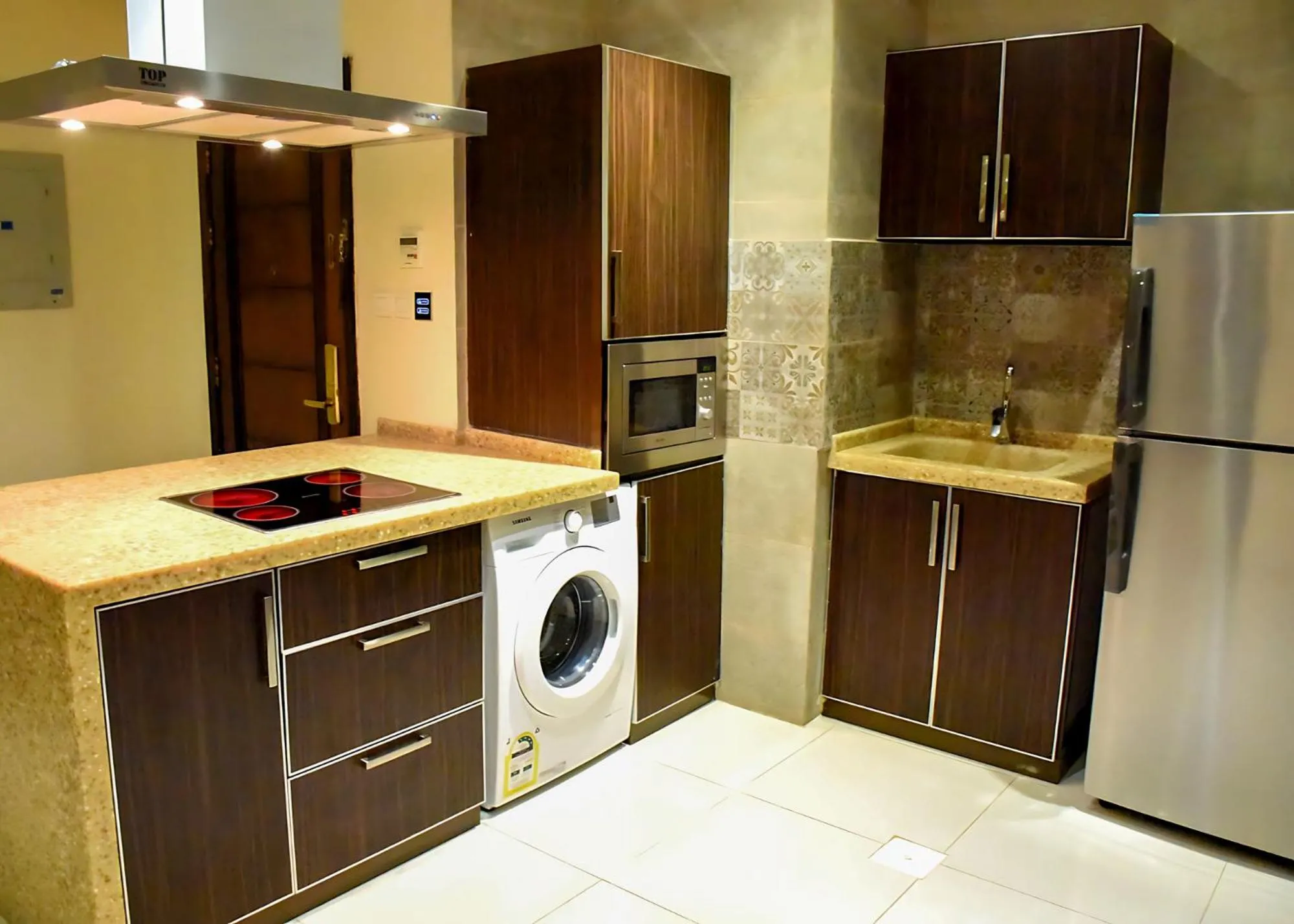 Kitchen or kitchenette in Procare Apart hotel