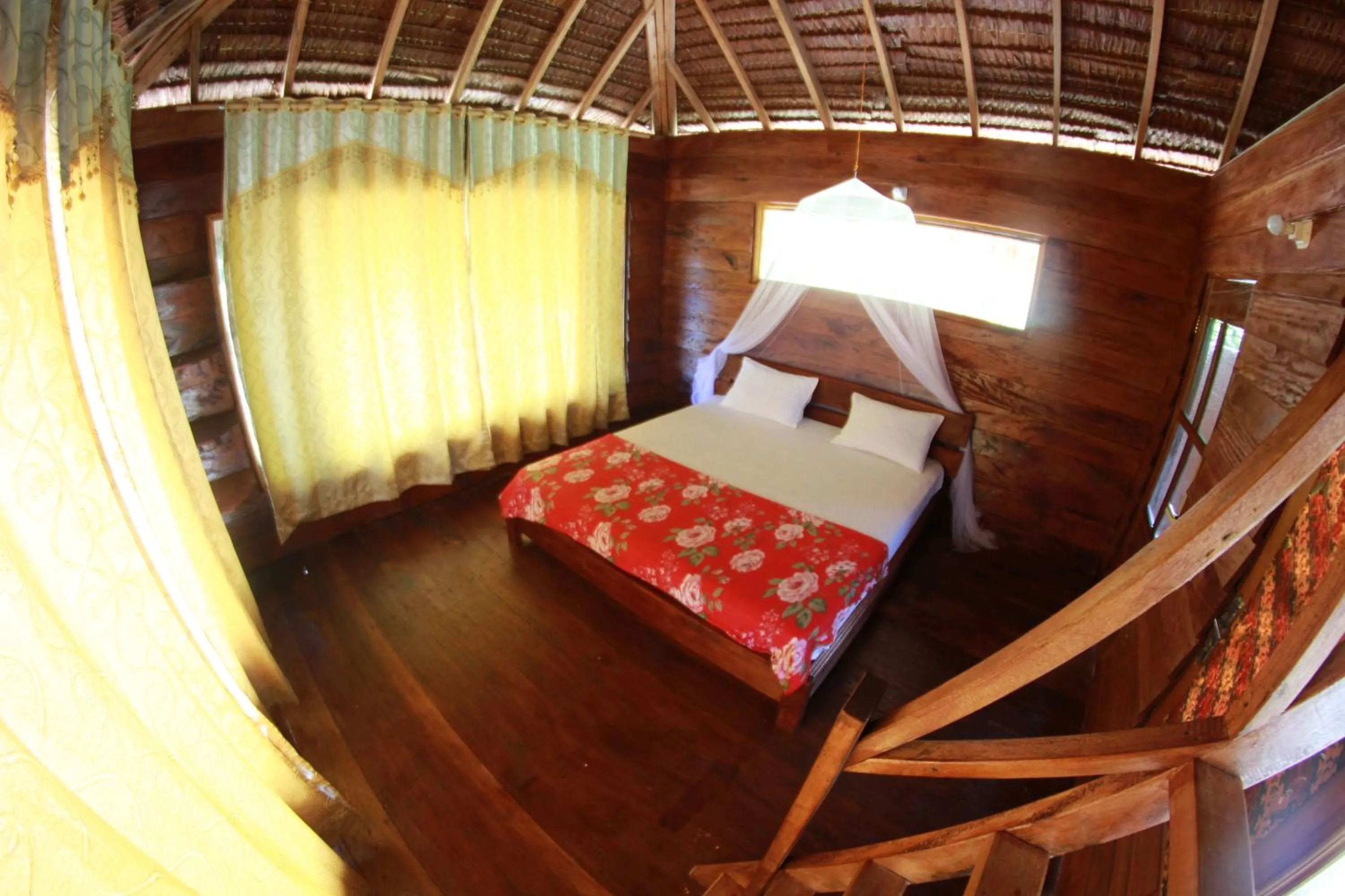 Photo of the whole room, Bed in Ricky's Beach House