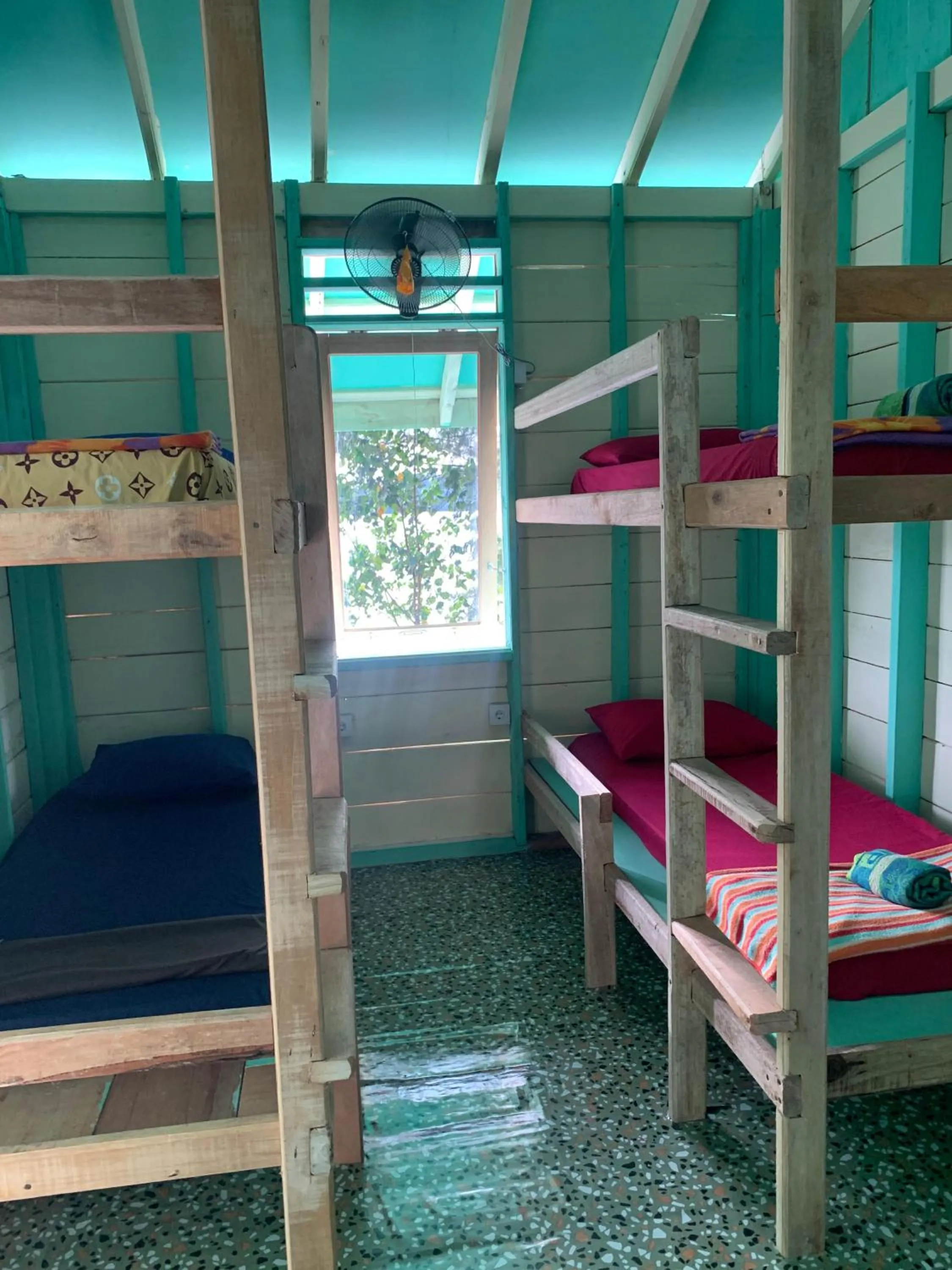 Photo of the whole room, Bed in Ricky's Beach House