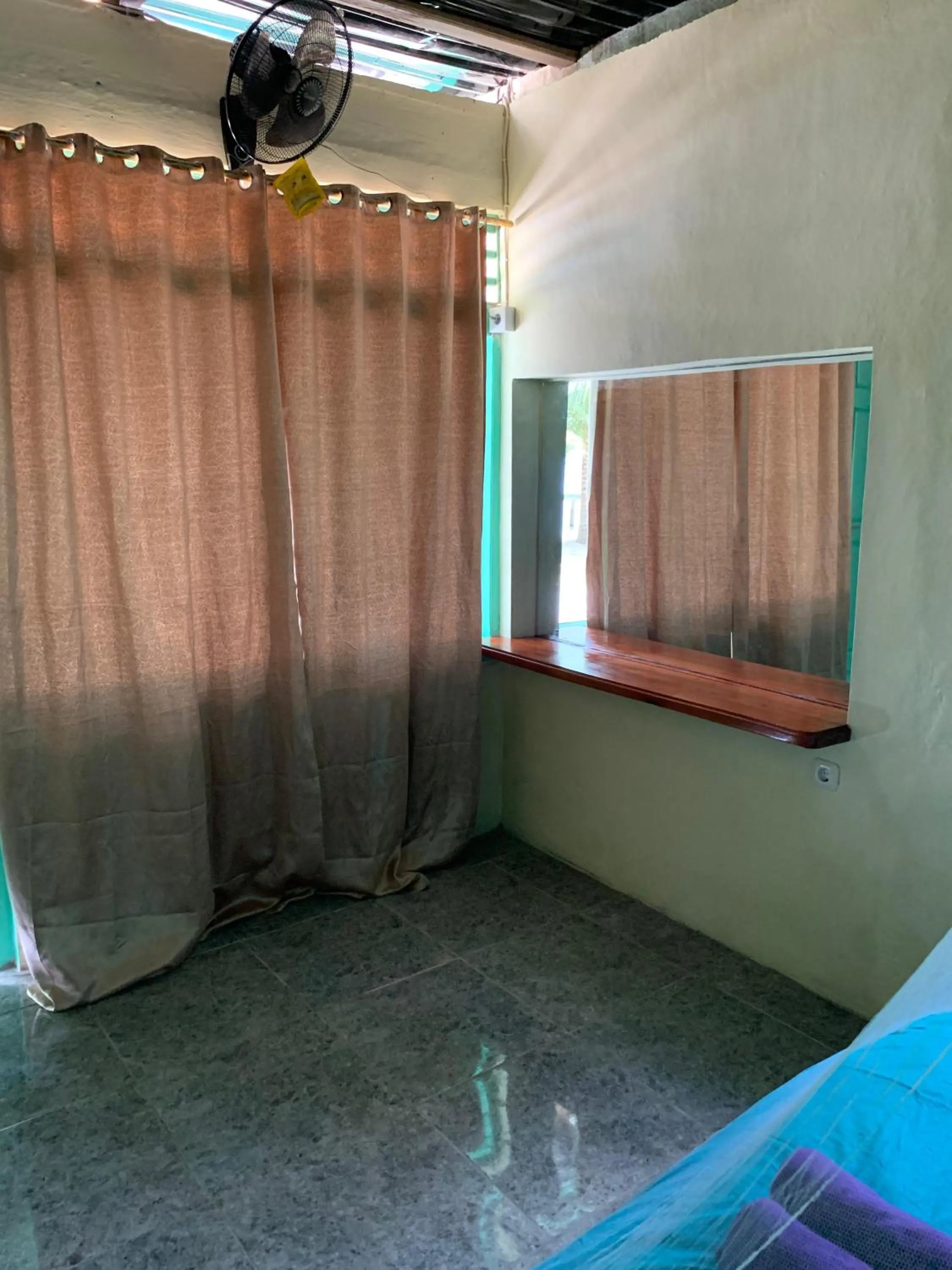 Bed in Ricky's Beach House