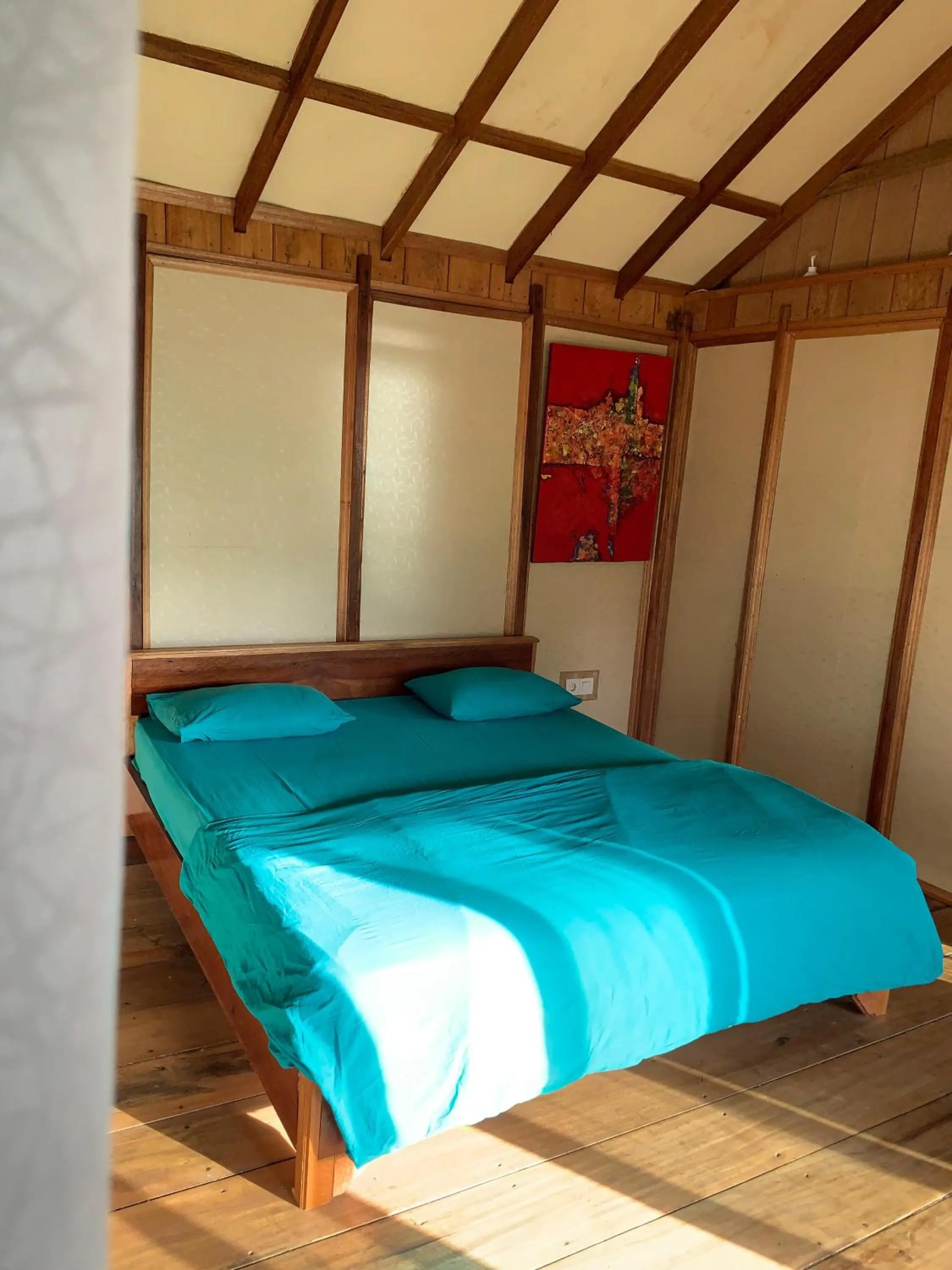 Bed in Ricky's Beach House