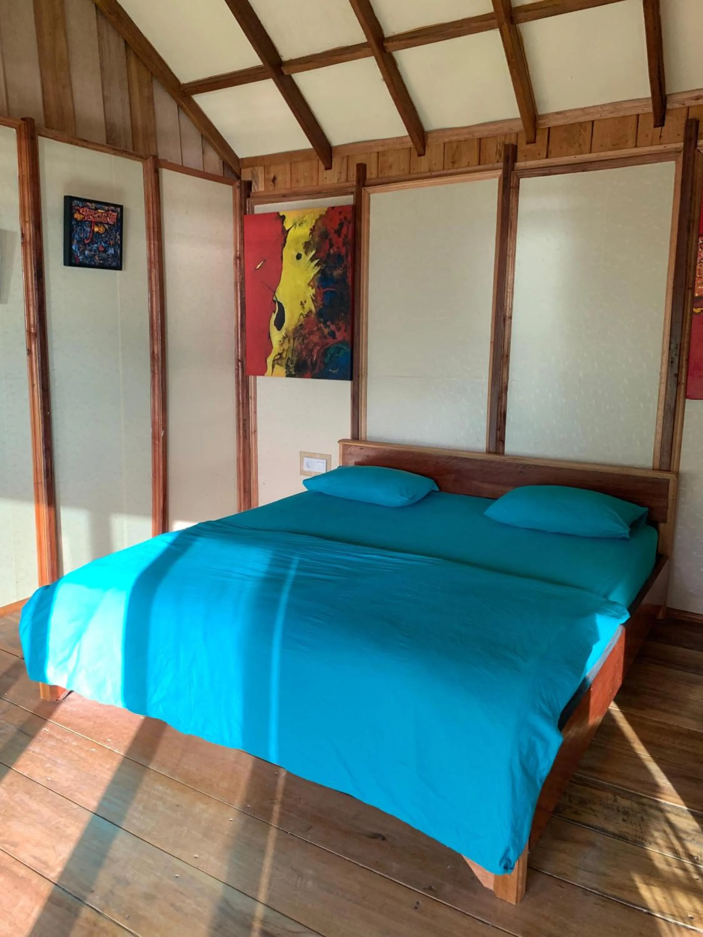 Bed in Ricky's Beach House
