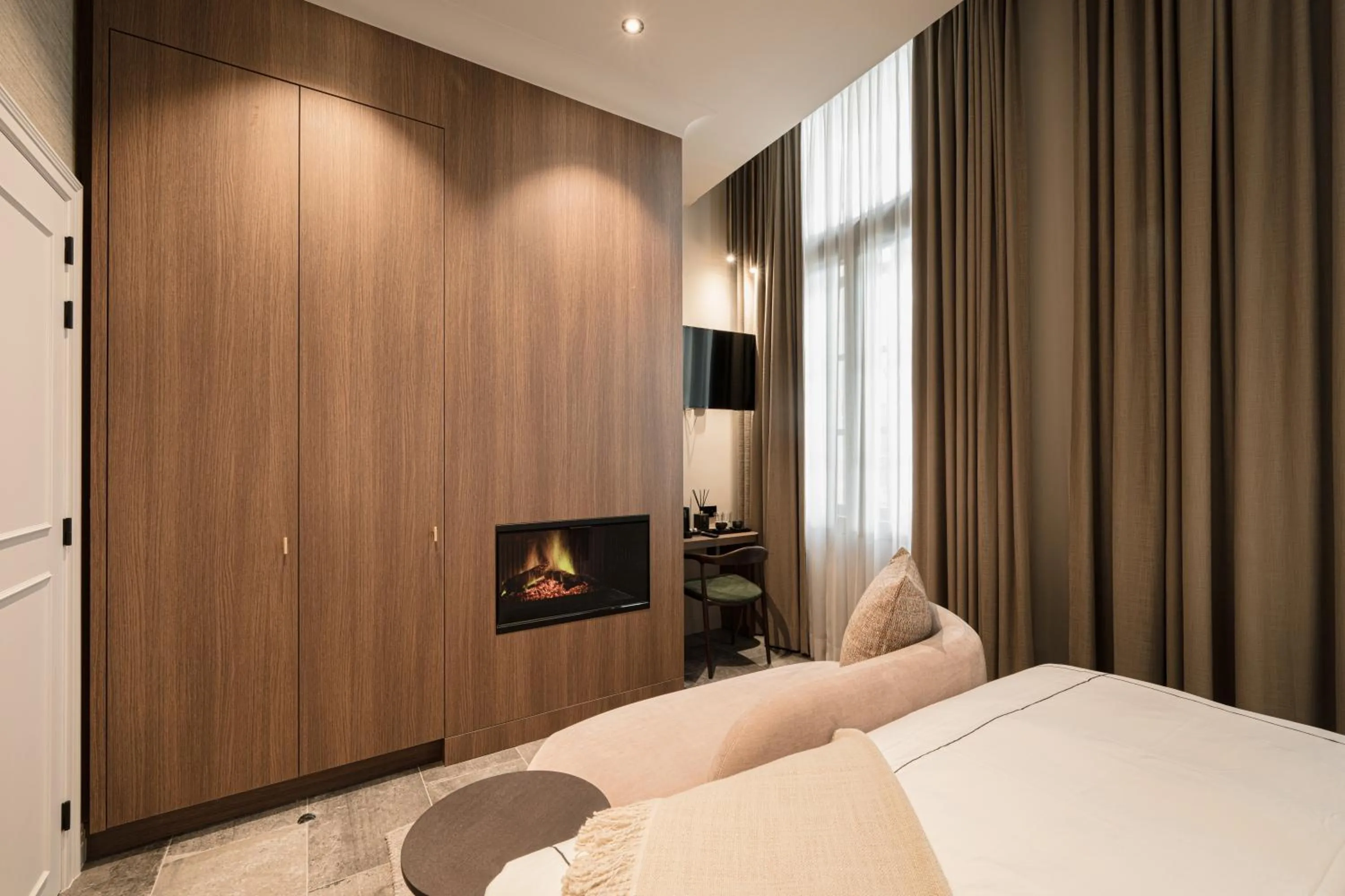 fireplace, Bed in Boutiquehotel Le Foulage - adults only