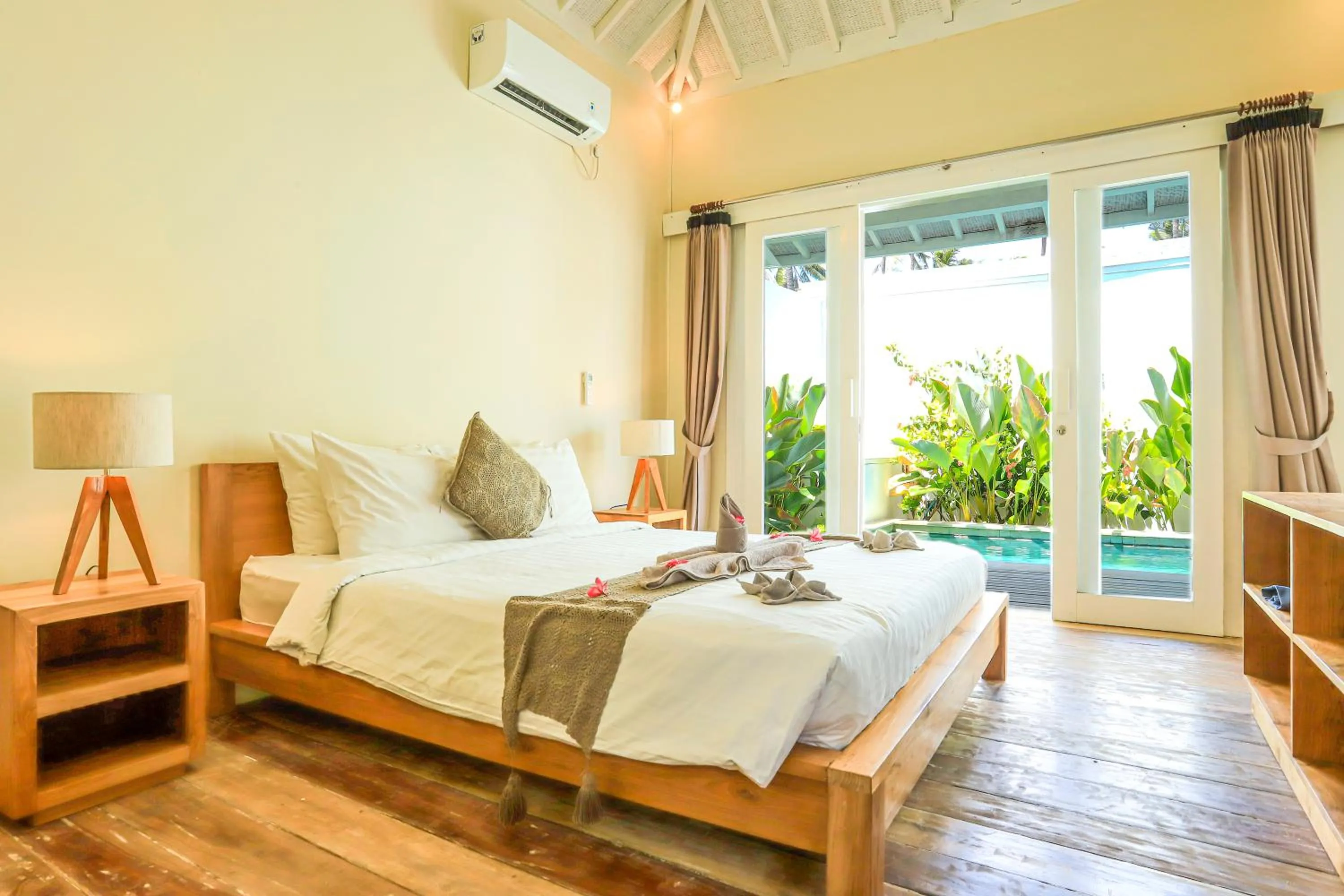 Bed in Villas Edenia - Luxe Villas with Private Pools