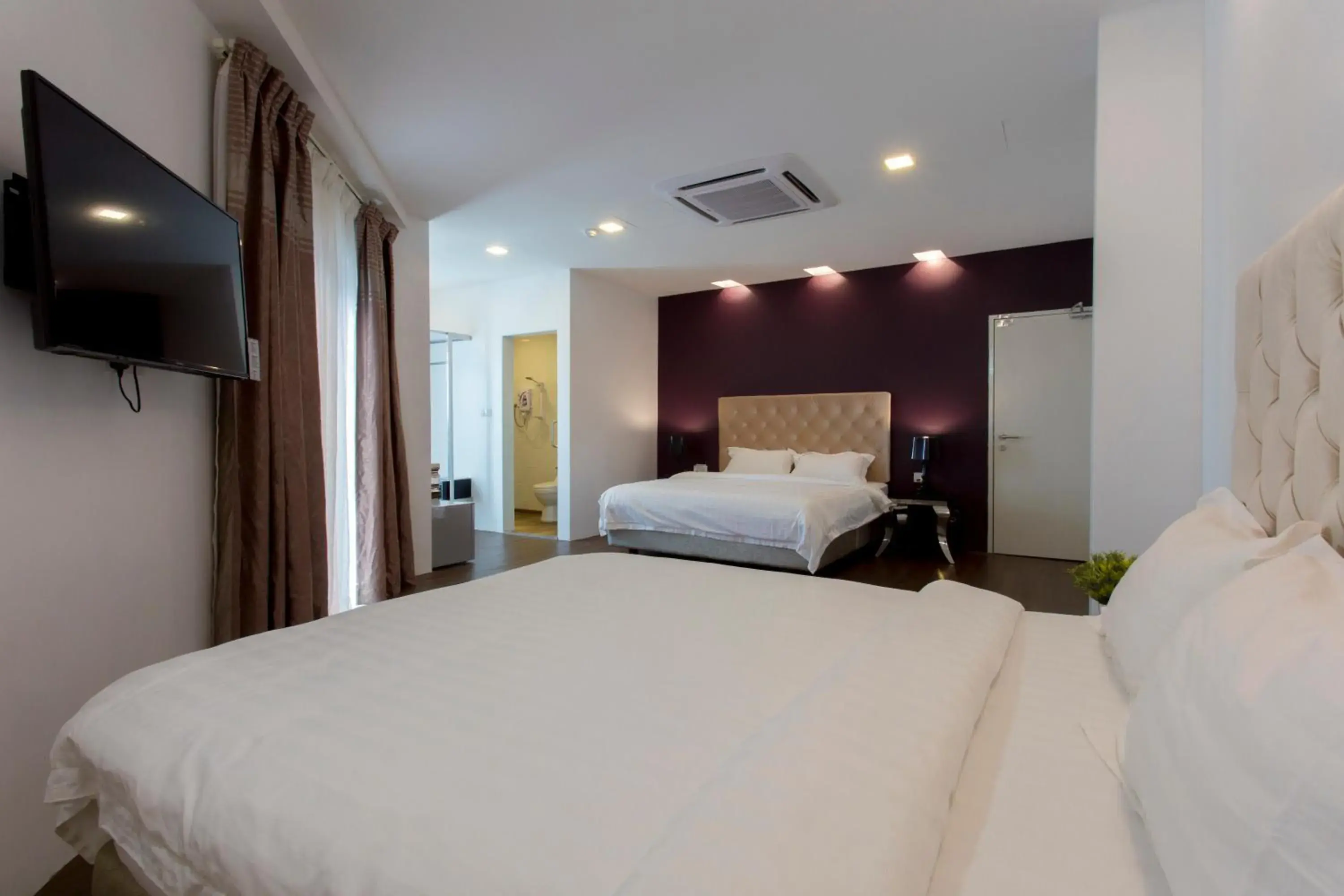 Bedroom, Bed in Aloha Hotel SDN BHD Bedroom, Bed in Aloha Hotel SDN BHD