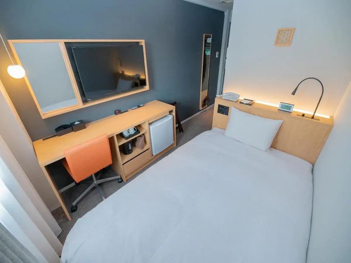 Bed in Central Hotel Takeoonsen Ekimae Bed in Central Hotel Takeoonsen Ekimae