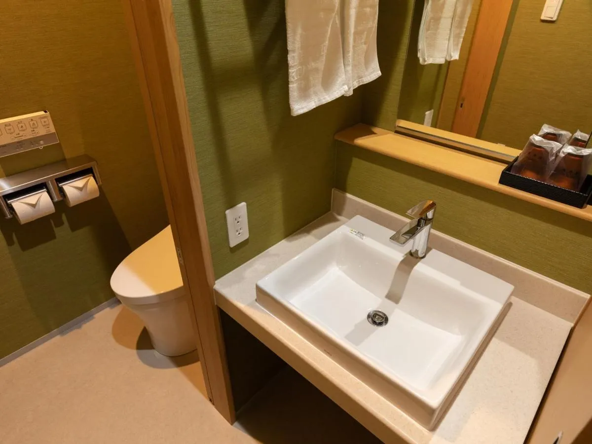 Bathroom in Central Hotel Takeoonsen Ekimae