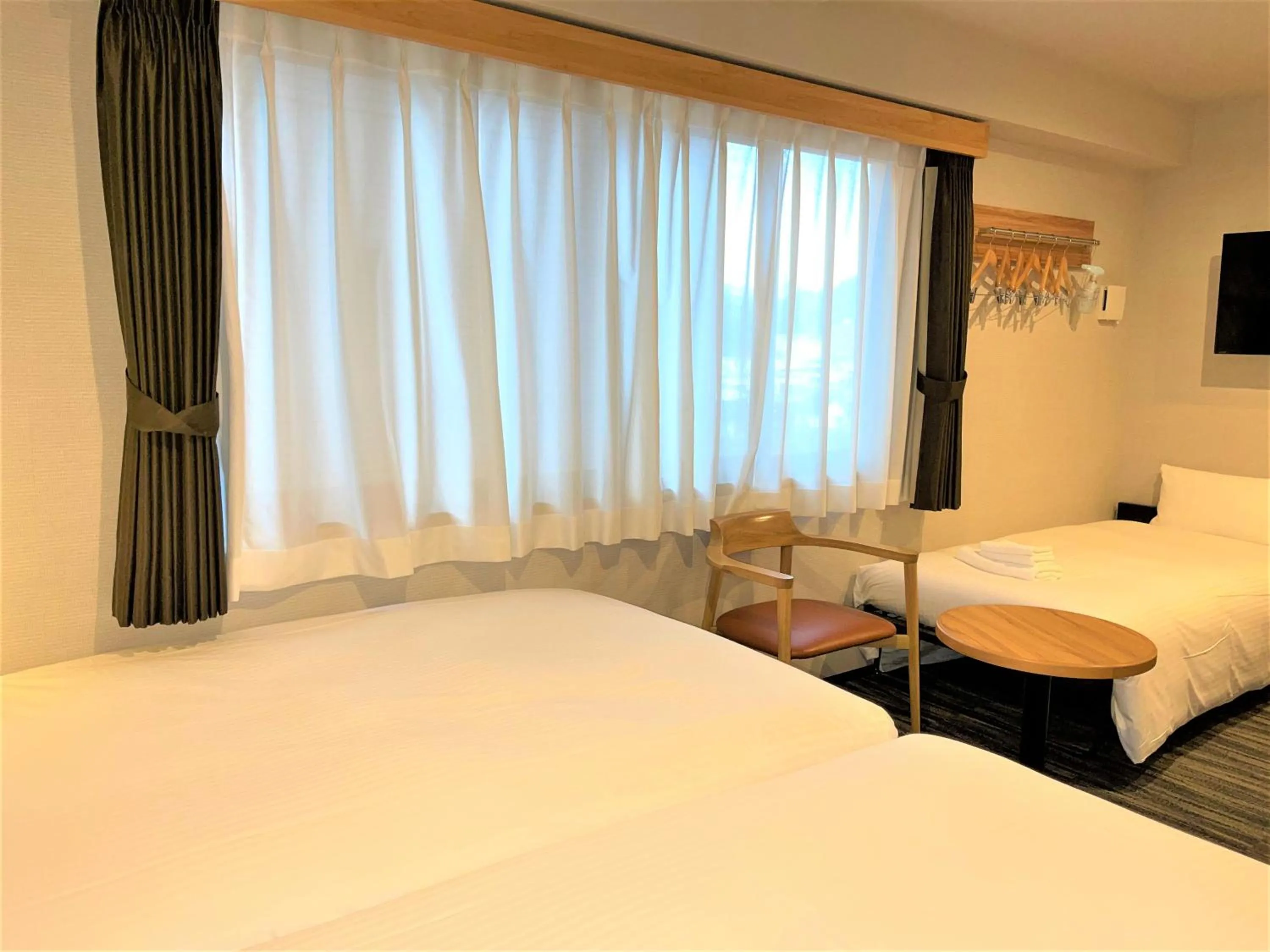 Bed in Central Hotel Takeoonsen Ekimae