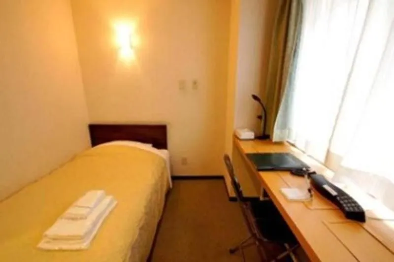 Bed in Comfesta Inn Kabe