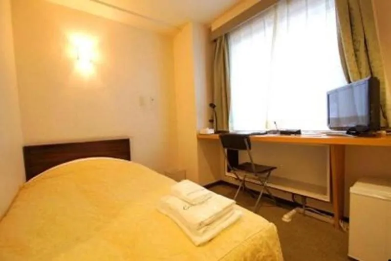 Bed in Comfesta Inn Kabe