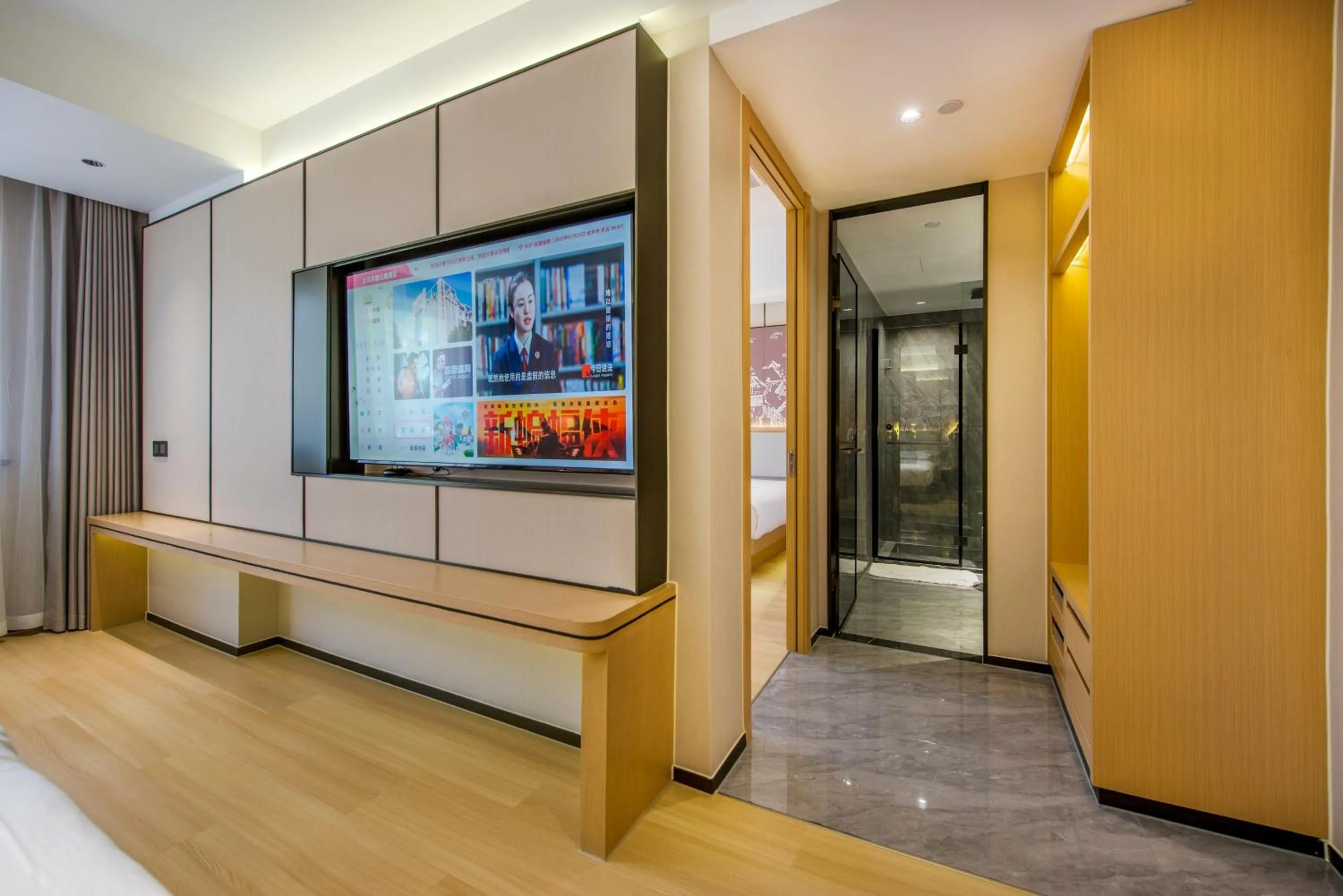 Communal lounge/ TV room in Yiwu Baide Theme Hotel