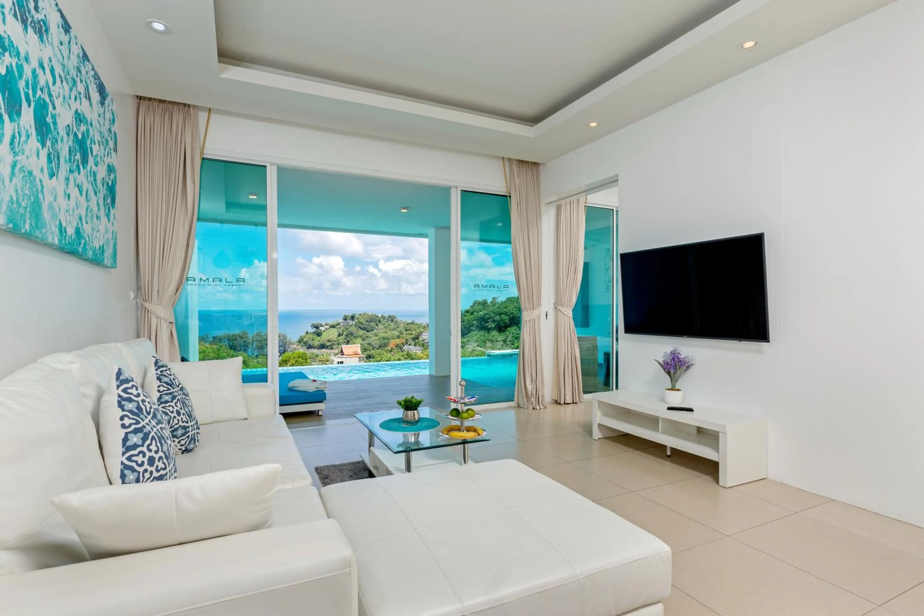 Living room in Amala Grand Bleu Resort Hilltops - SHA