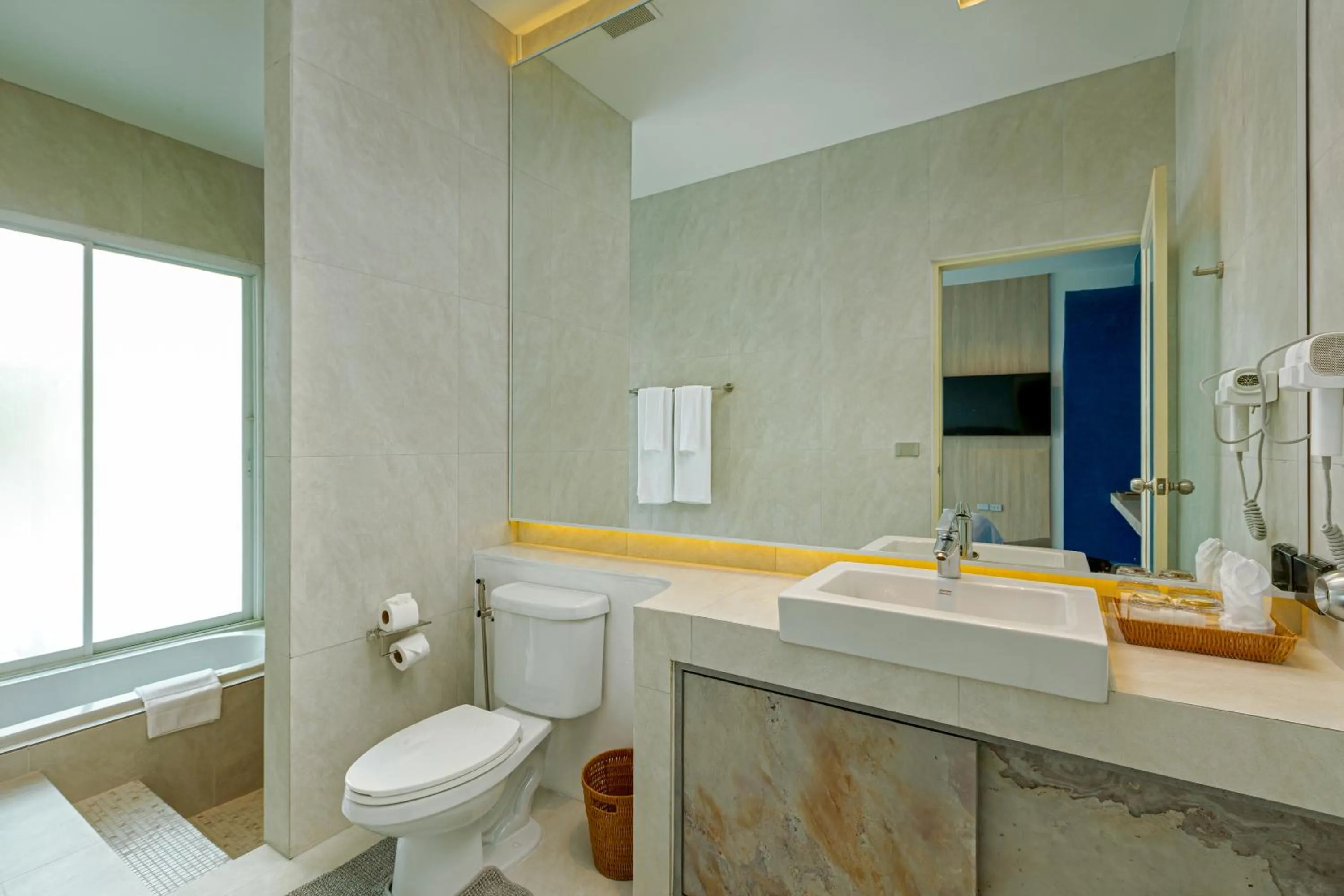 Toilet in Amala Grand Bleu Resort Hilltops - SHA