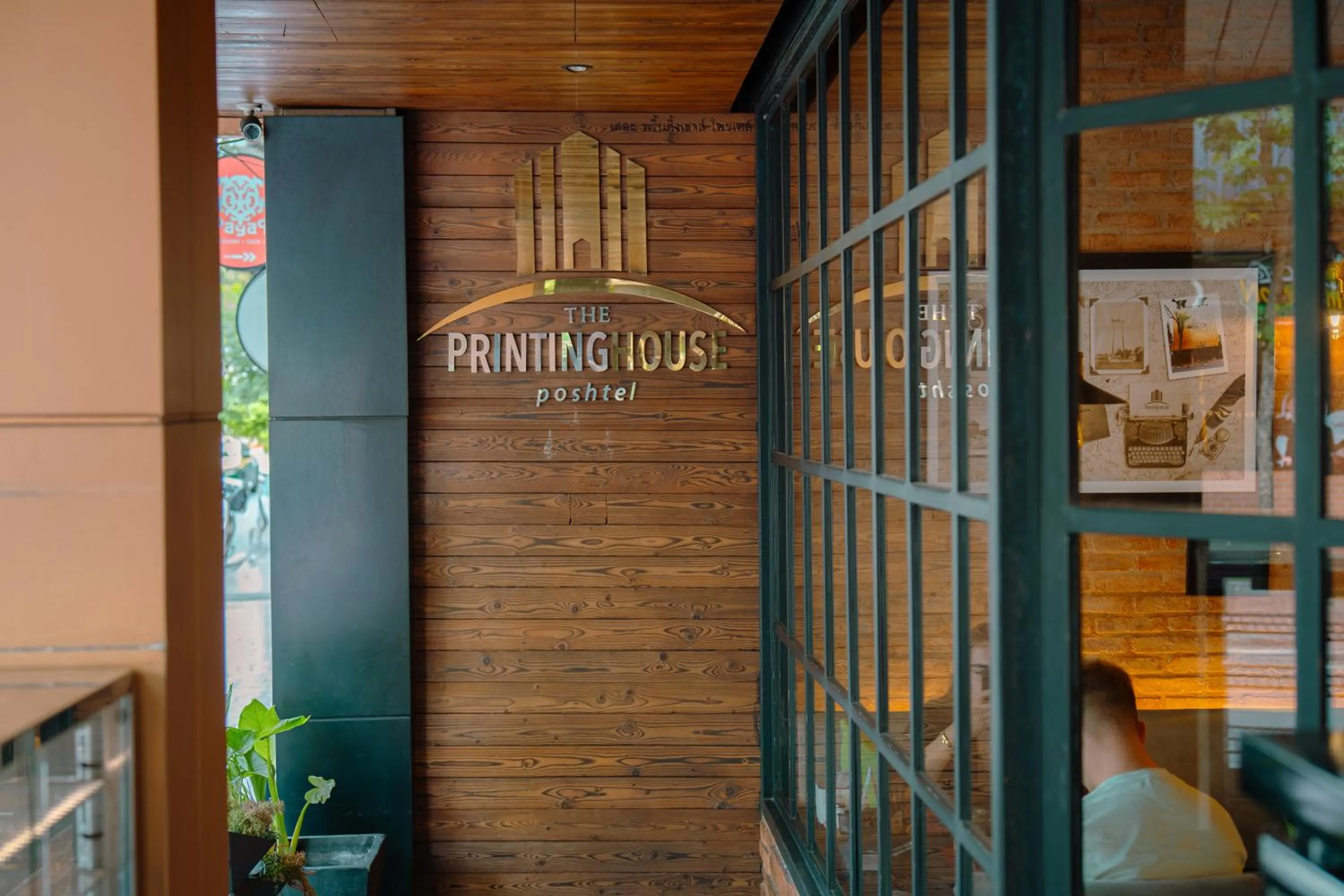 Property logo or sign in The Printing House Poshtel