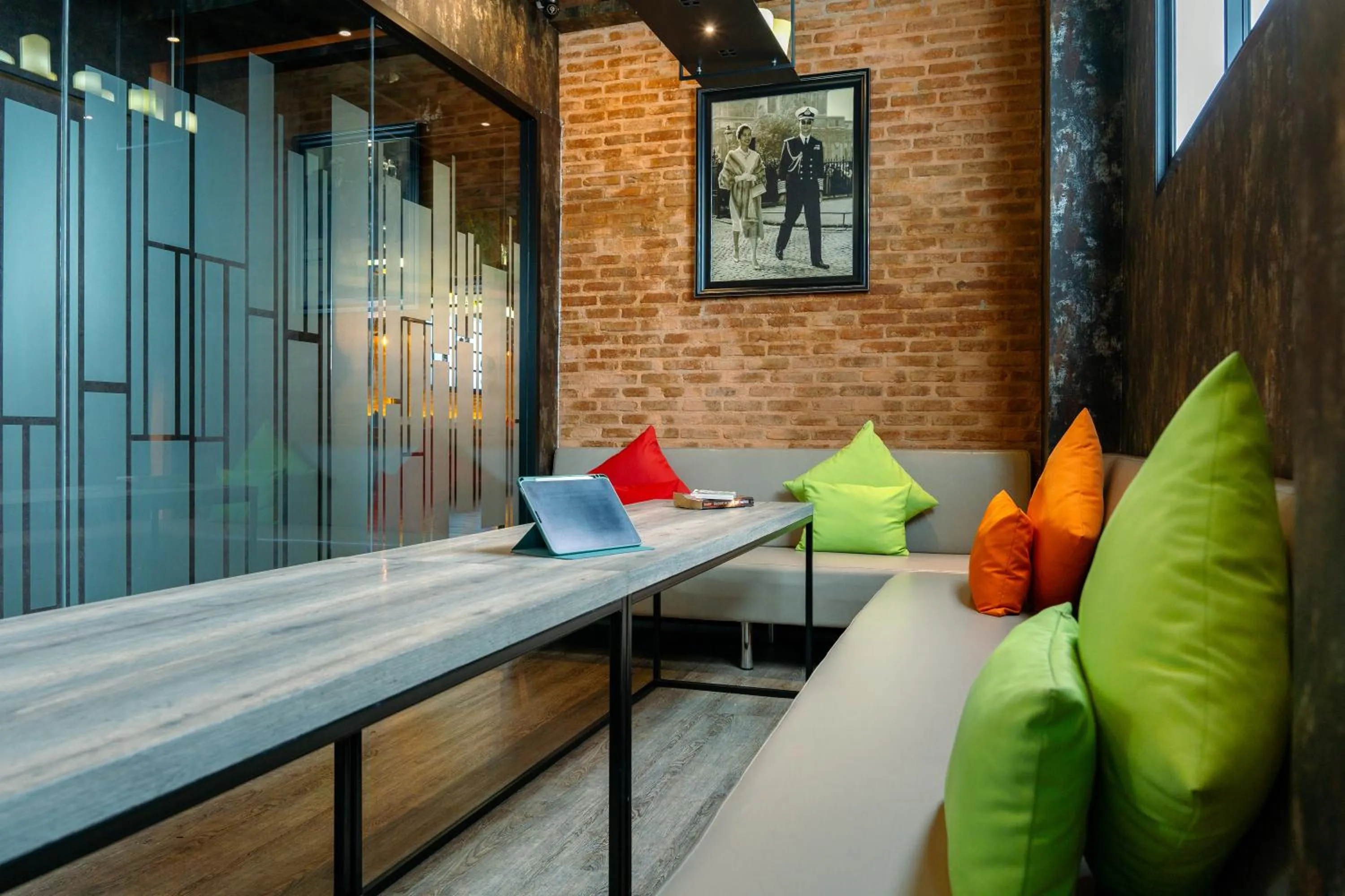 Communal lounge/ TV room in The Printing House Poshtel