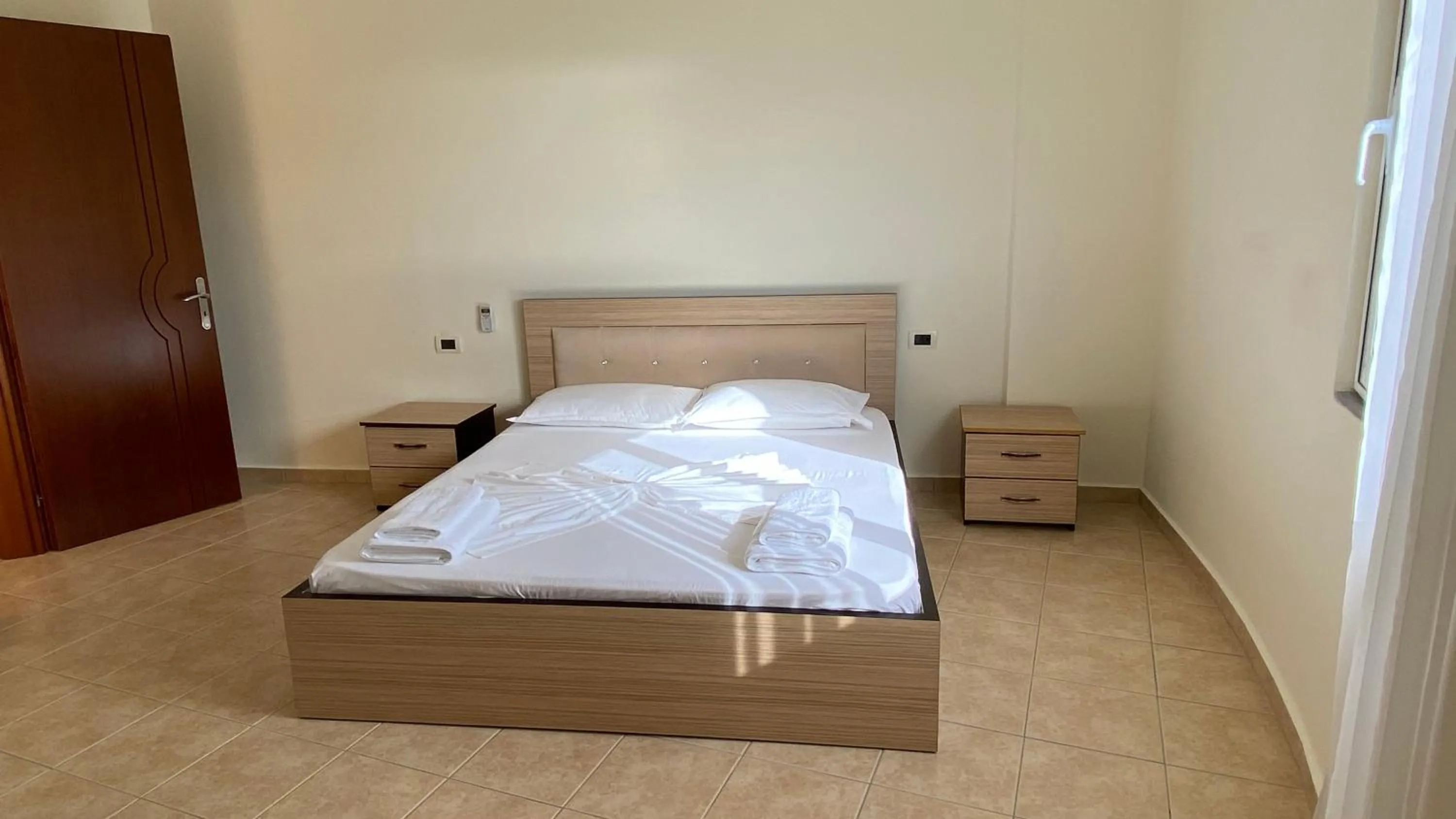 Bed in OniRana Apartments