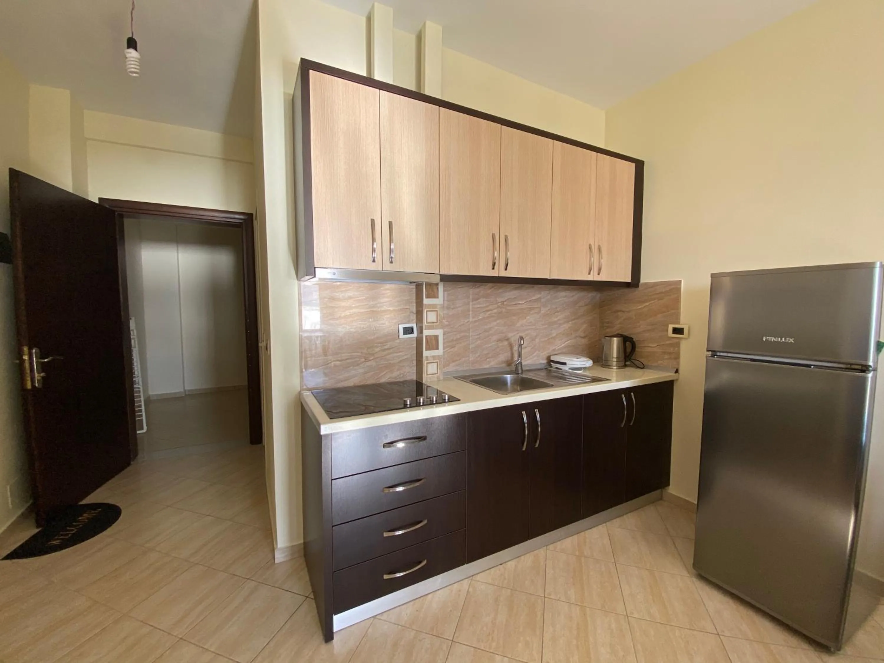 Kitchen or kitchenette in OniRana Apartments