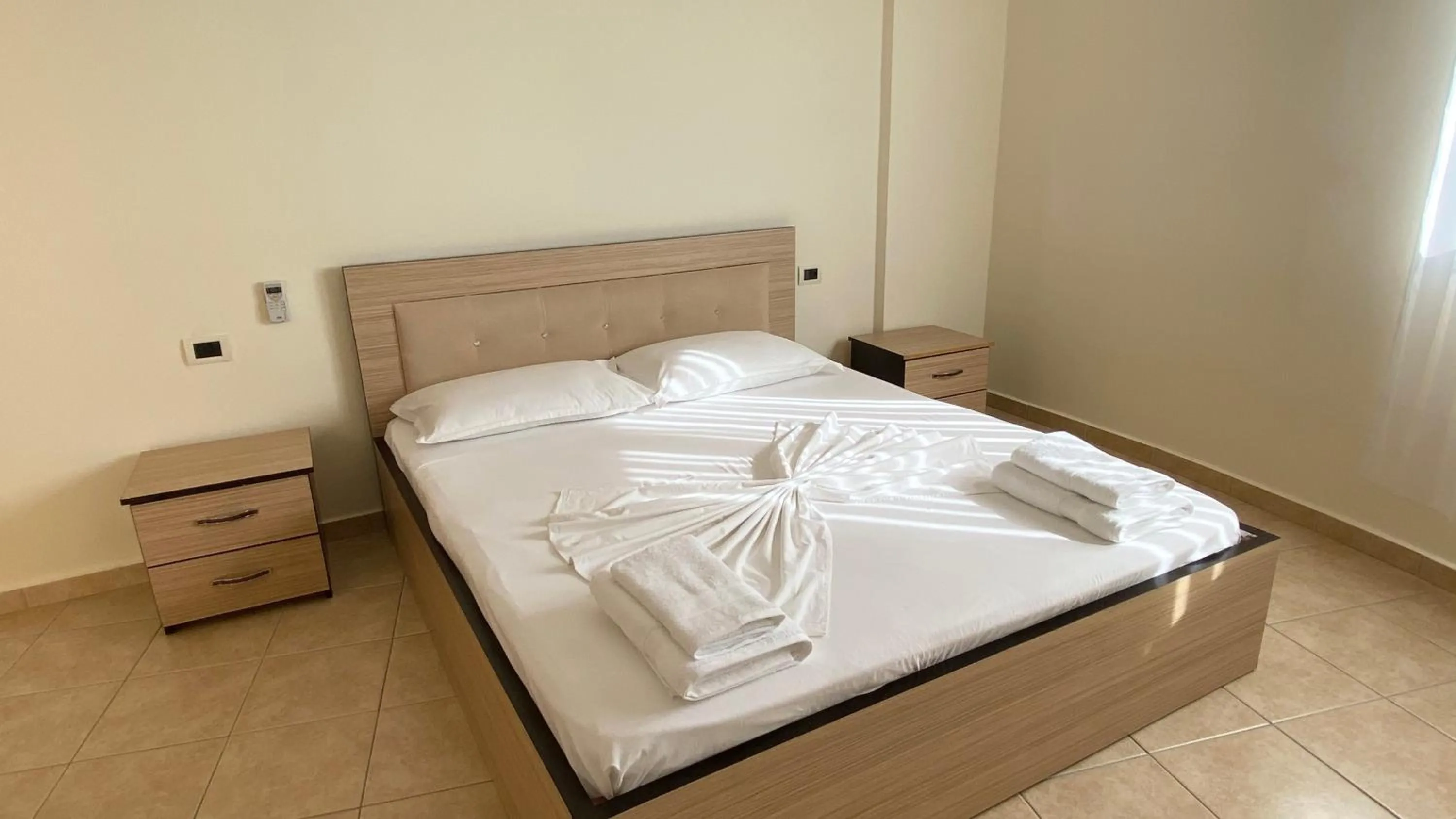 Bed in OniRana Apartments