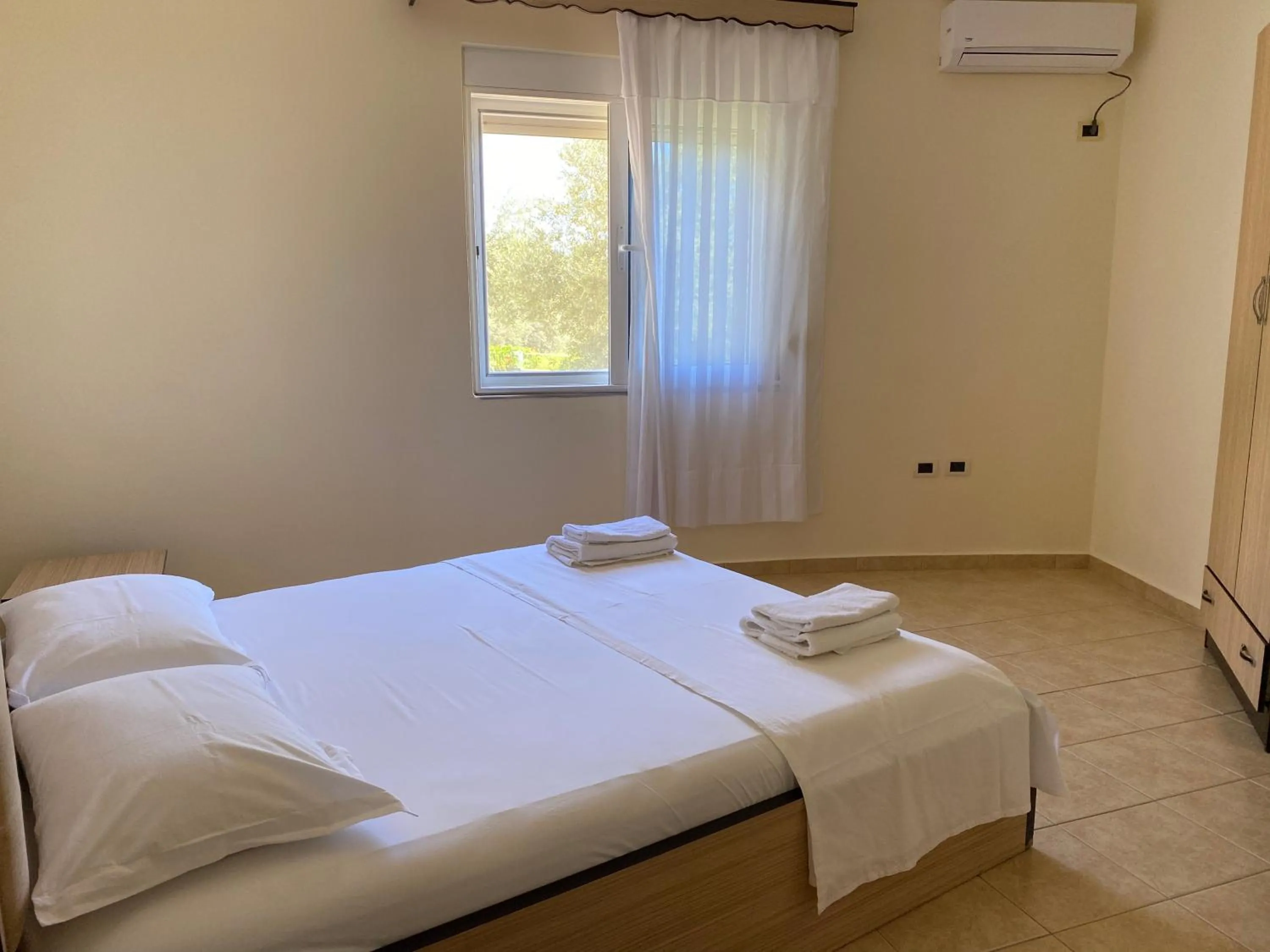 Bed in OniRana Apartments