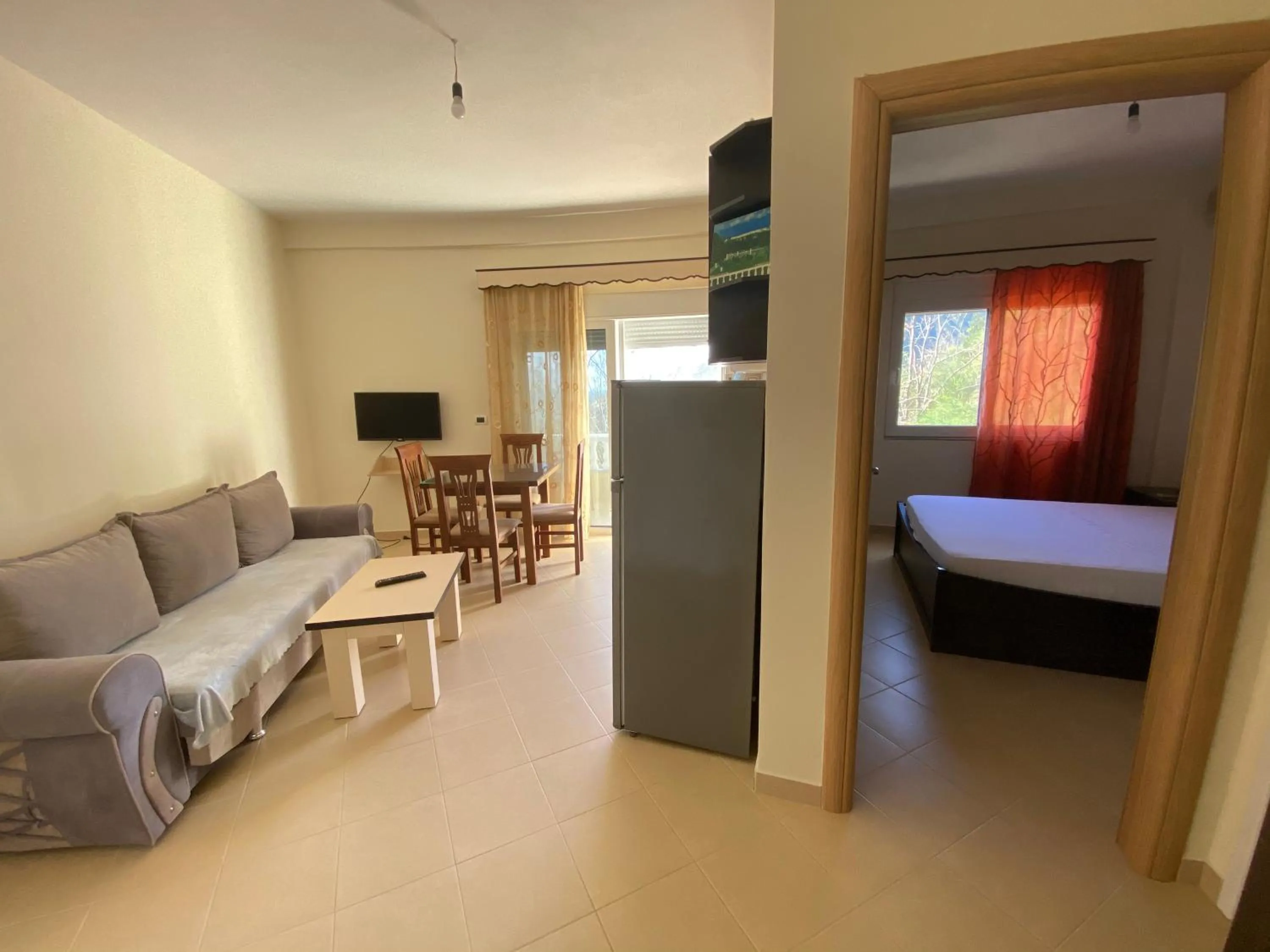 Living room, Bed in OniRana Apartments