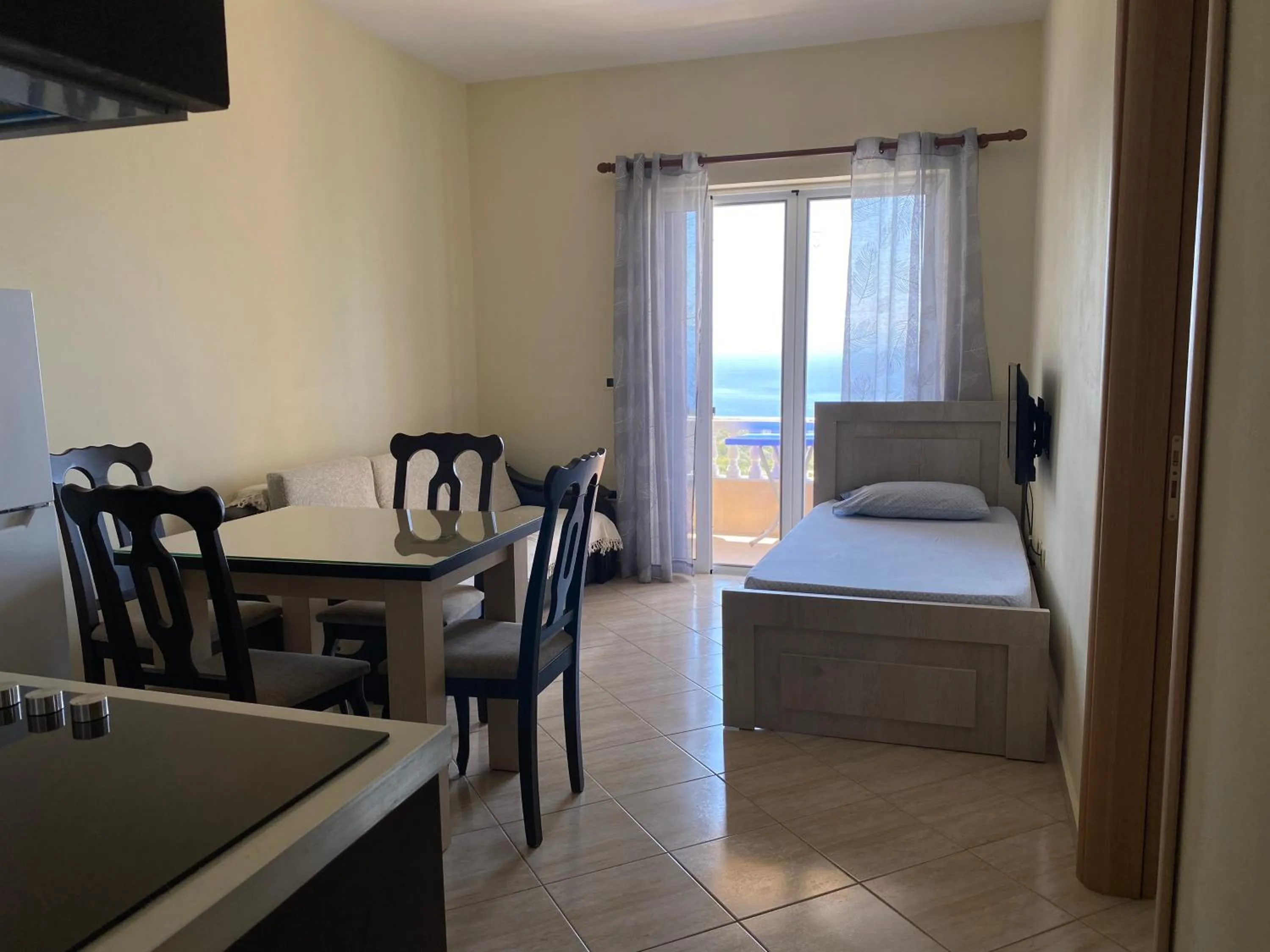 Living room, Bed in OniRana Apartments