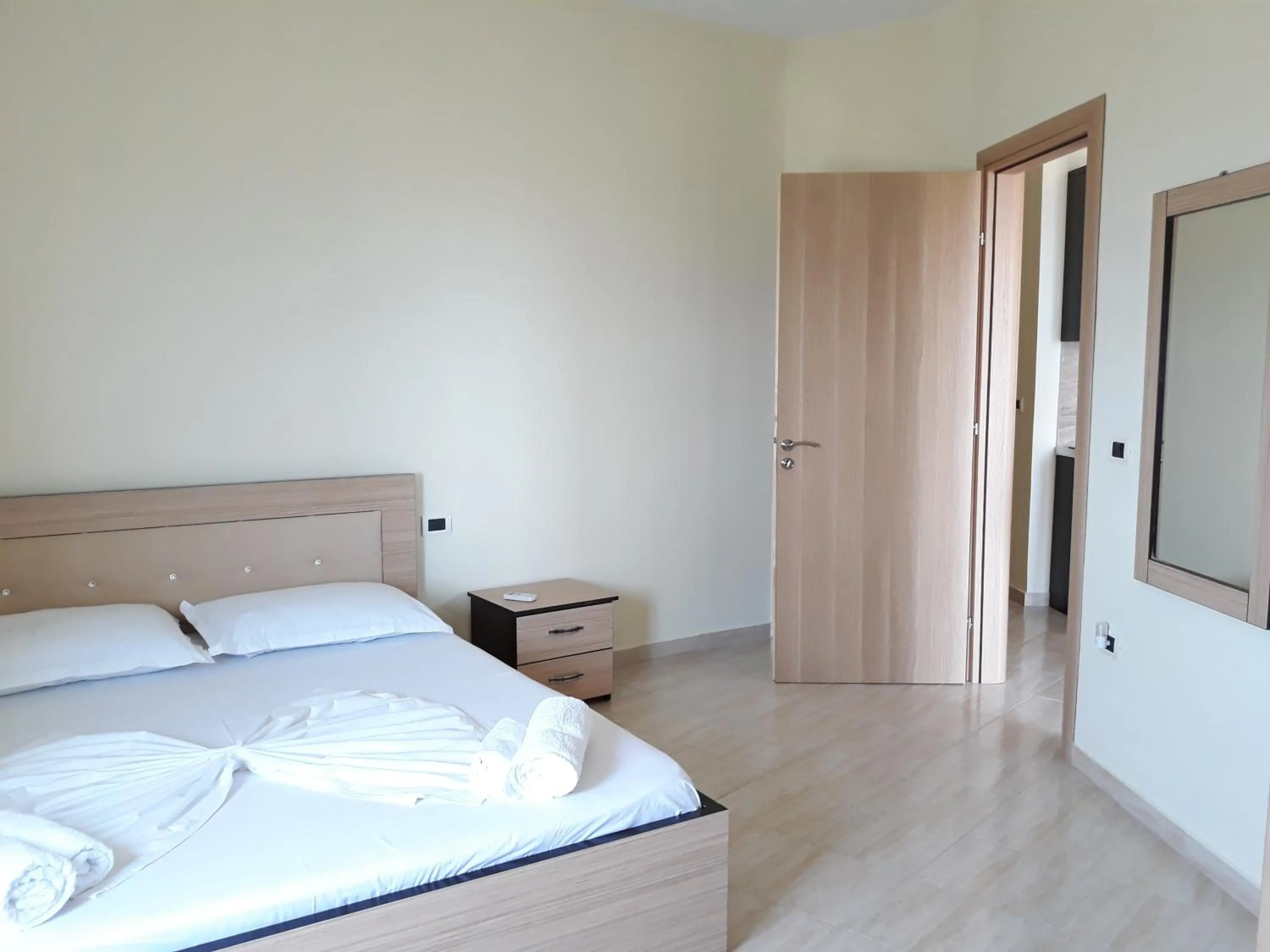 Bed in OniRana Apartments