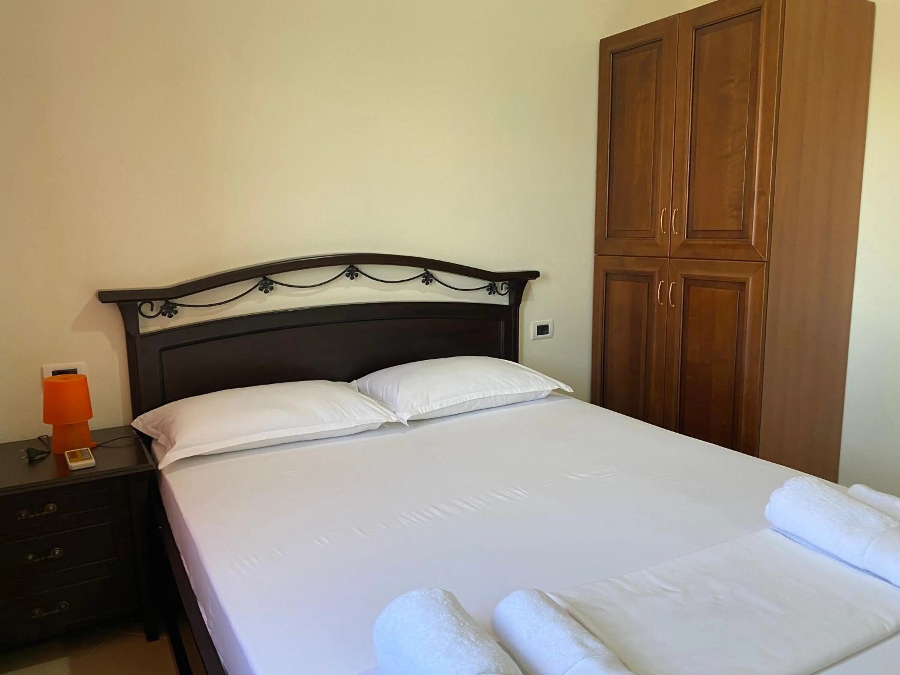 Bed in OniRana Apartments