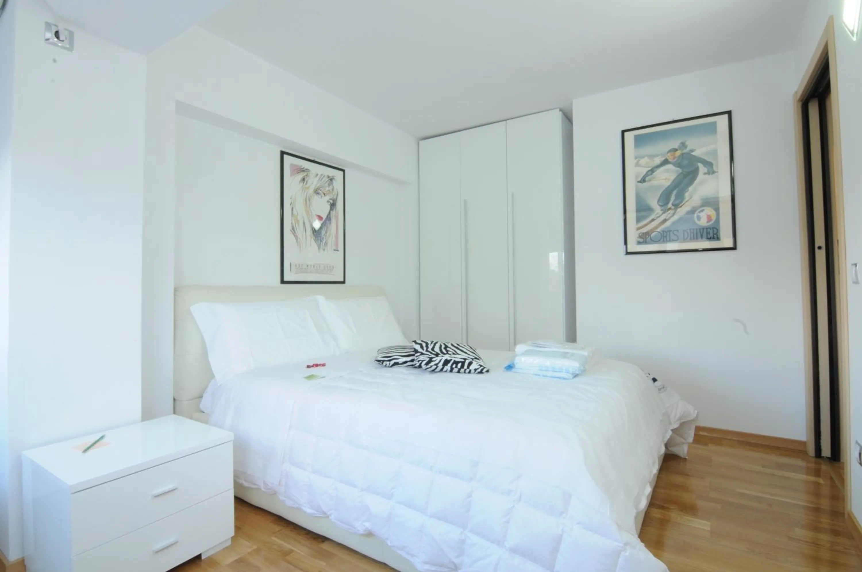 Bed in White Dream Suites