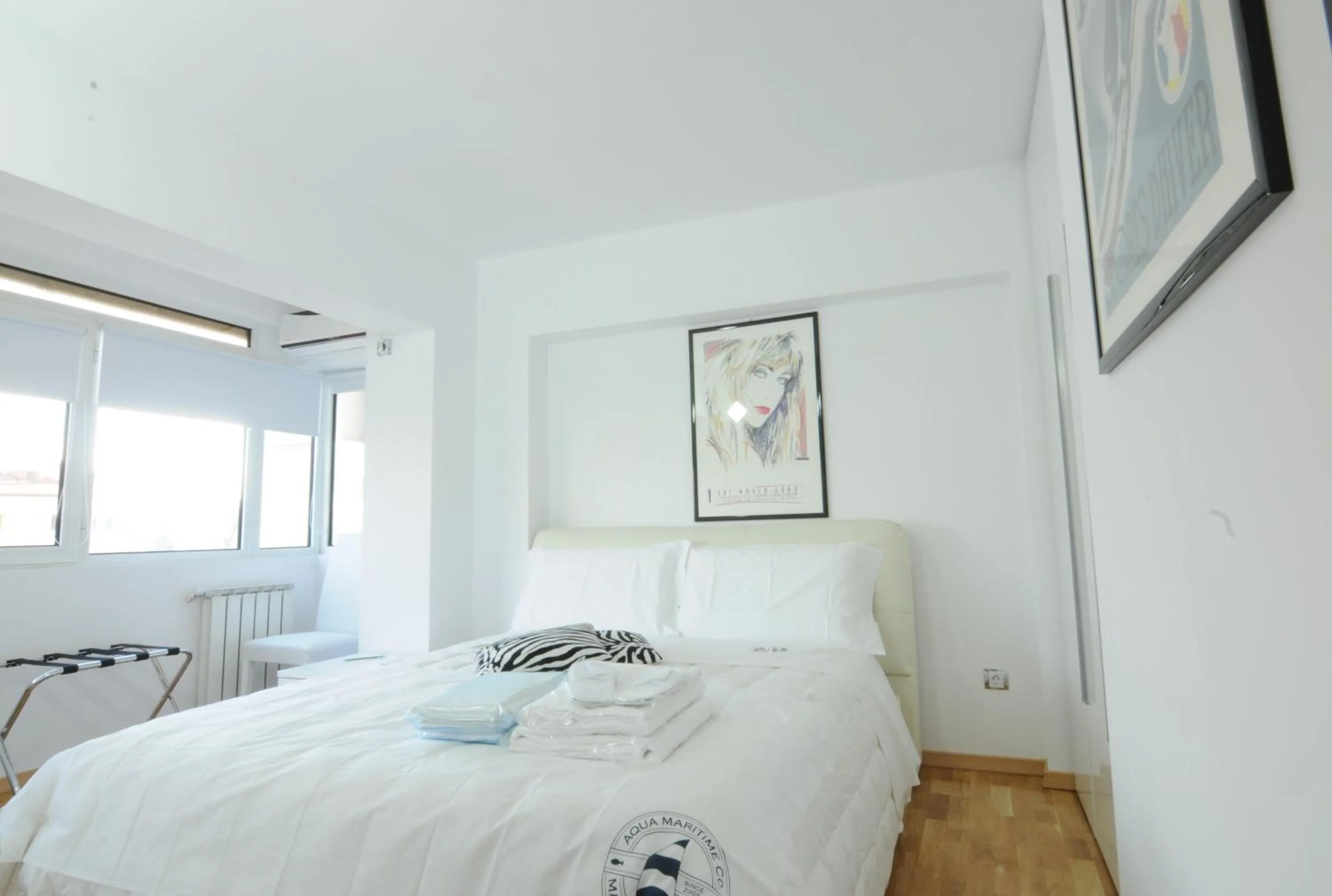 Bed in White Dream Suites